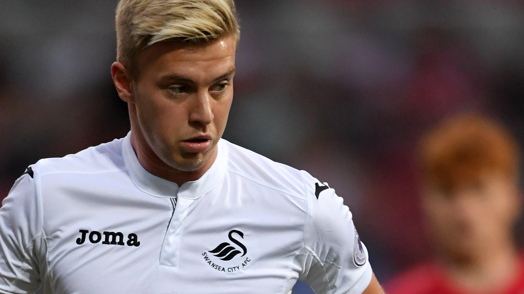 Adam King in action for Swansea City in pre-season