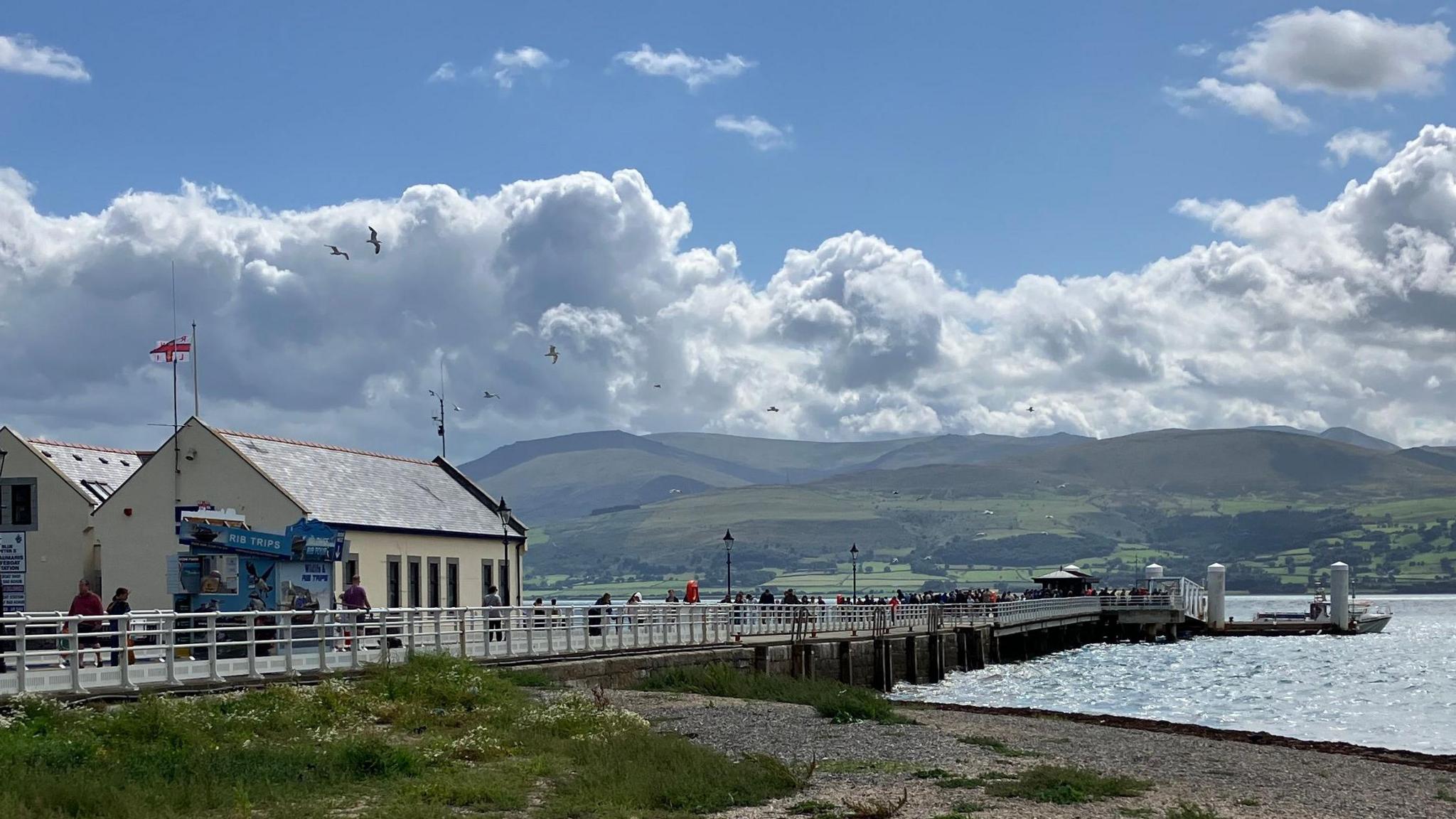 Beaumaris pier with views across the Menai Strait in Anglesey