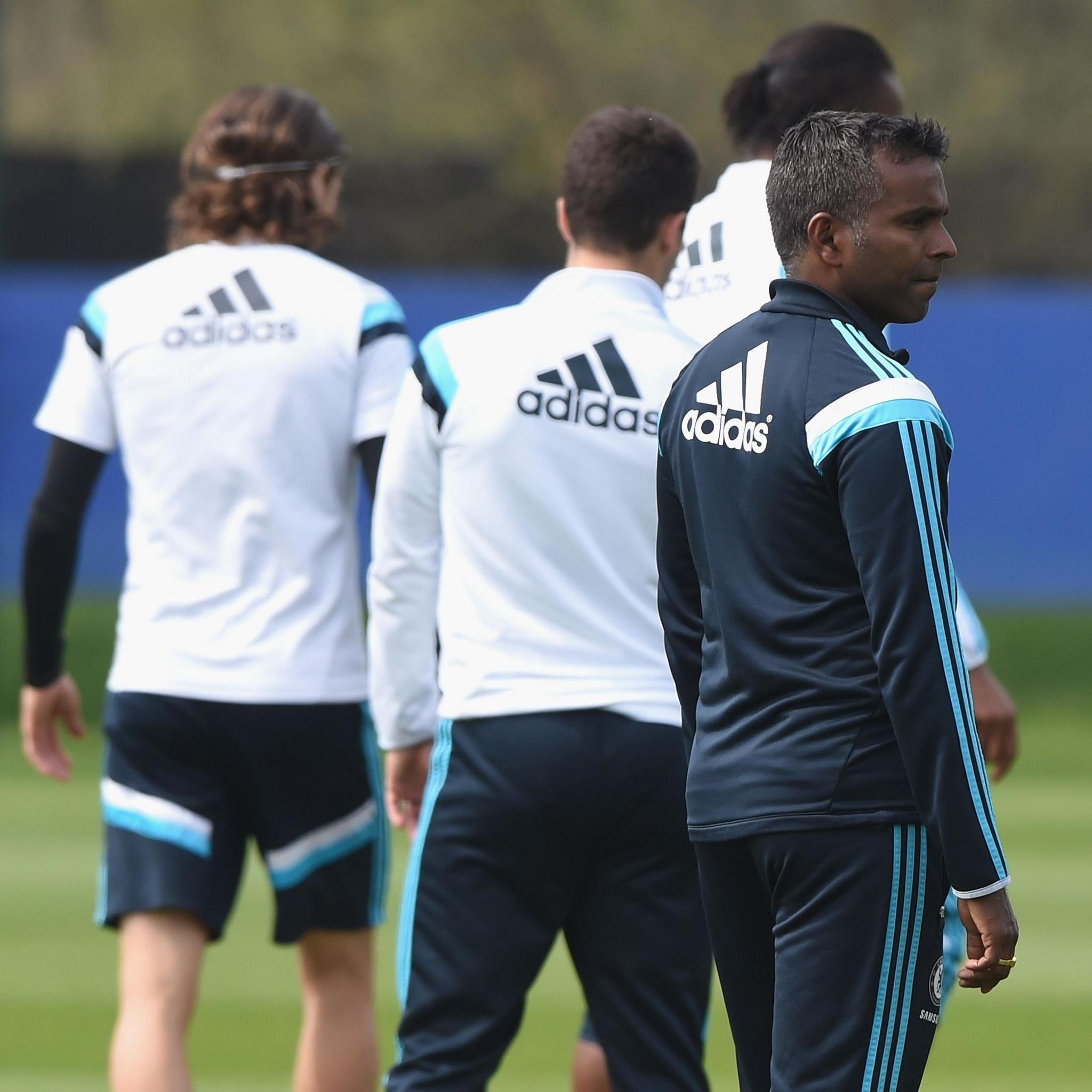 Vinay Menon at Chelsea training wearing a Chelsea jacket