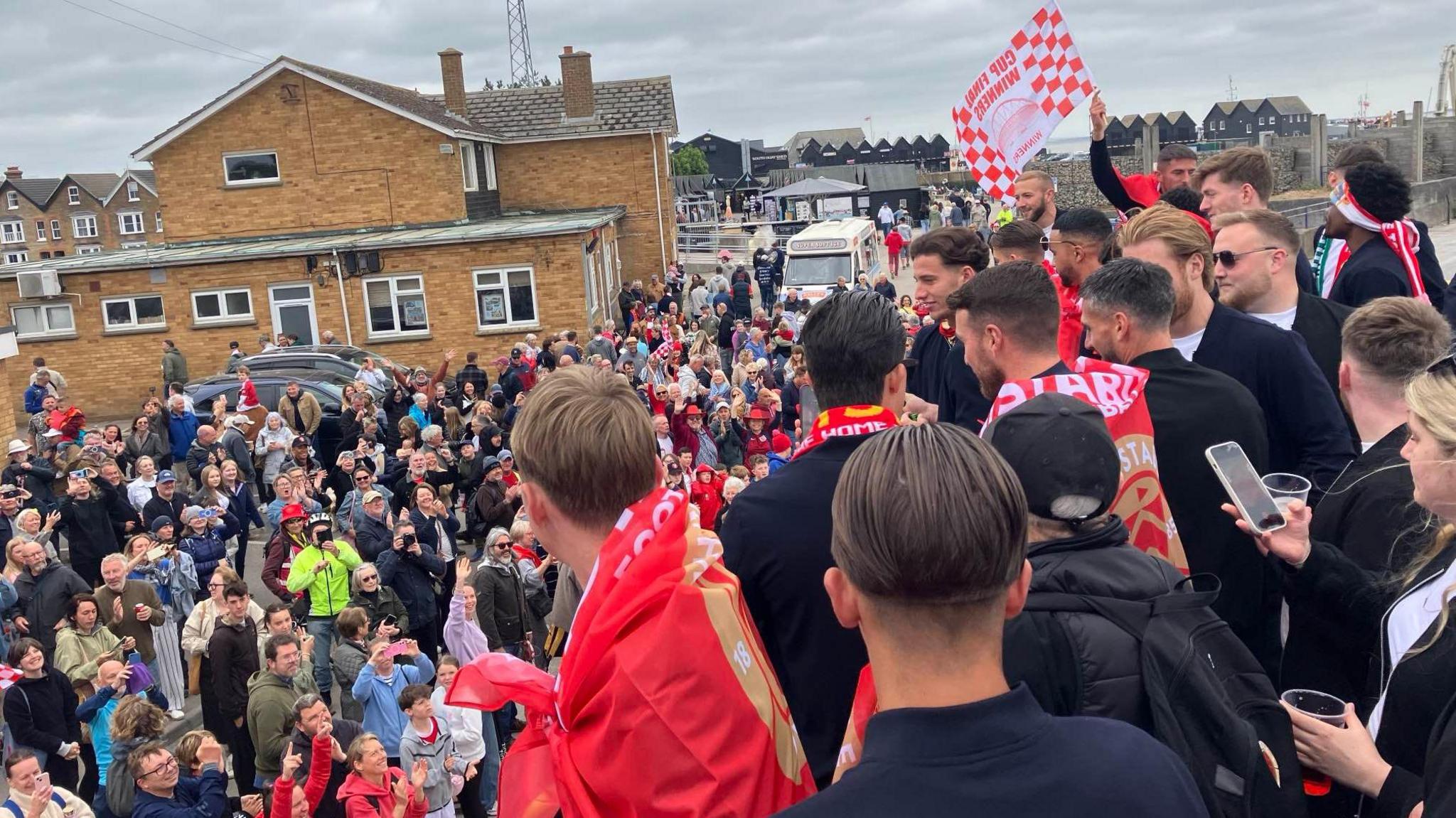 Open-top bus parade in Whitstable