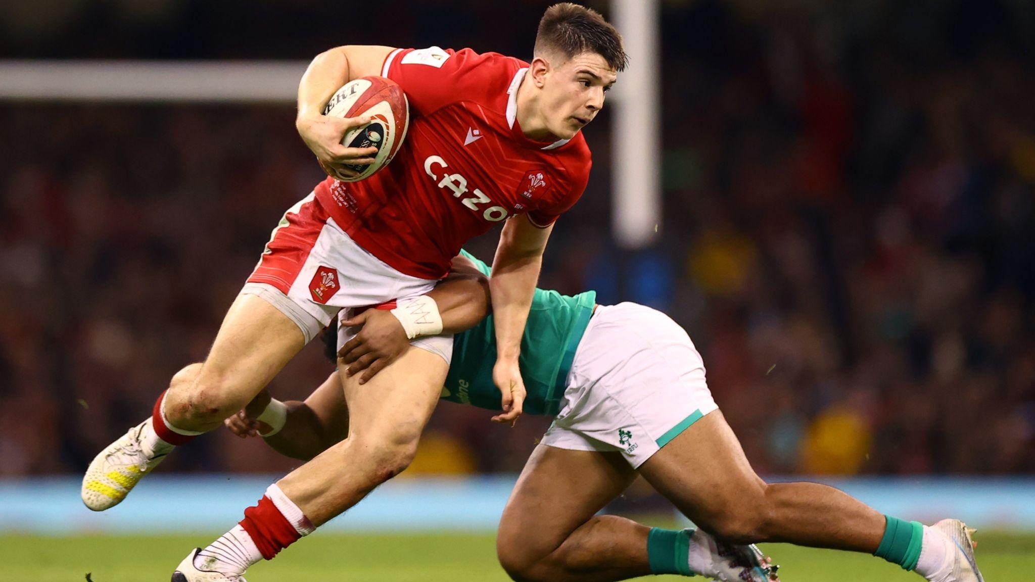 Wales' Joe Hawkins with the ball tries to evade a tackle against Ireland