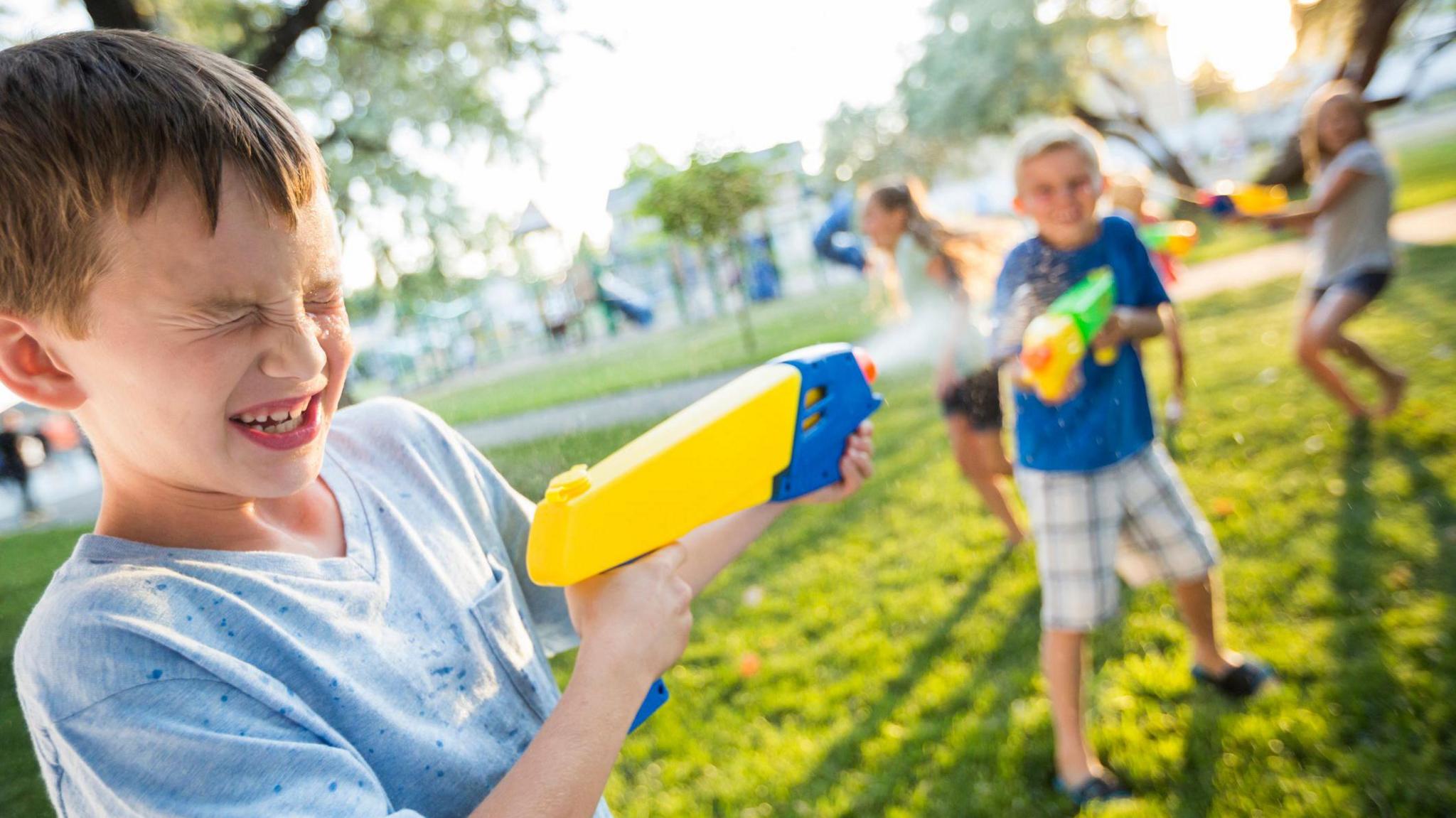 Children enjoying a water fight