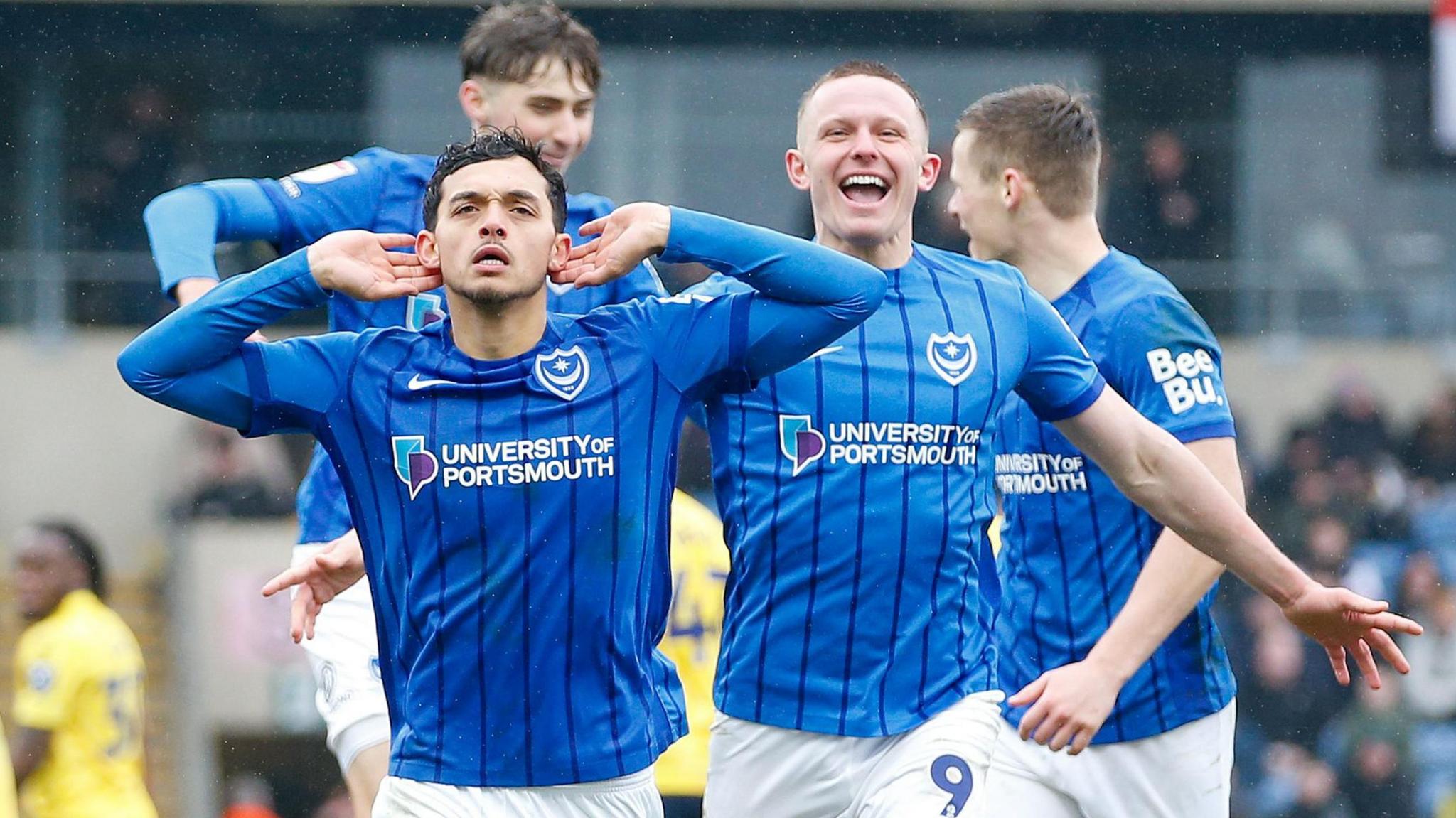 Andre Dozzell celebrates scoring at Oxford United in February
