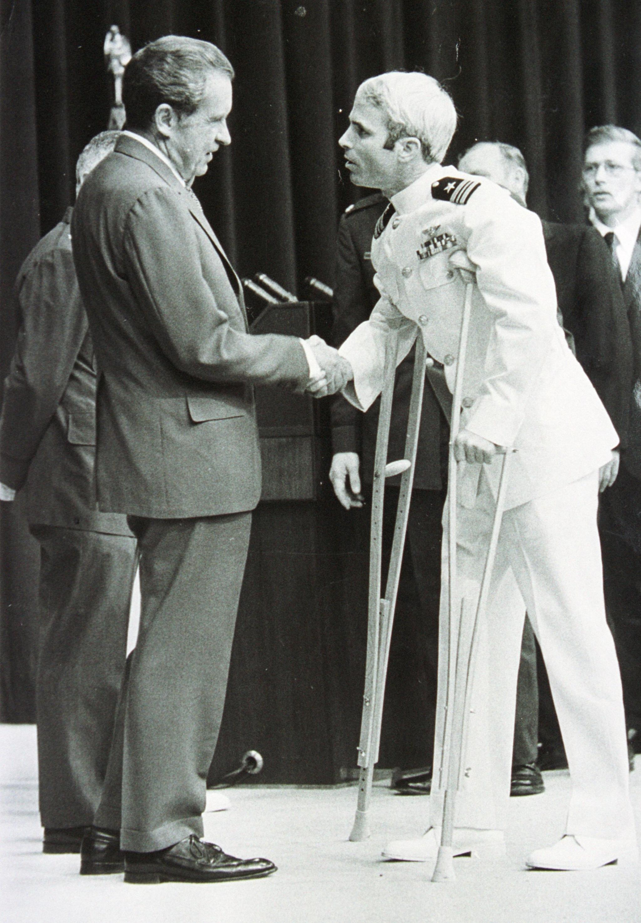 Lieutenant Commander John Mccain Is Welcomed By U.S. President Richard Nixon Upon Mccain's Release From Five And One-Half Years As A P.O.W. During The Vietnam War May 24, 1973 In Washington, D.C