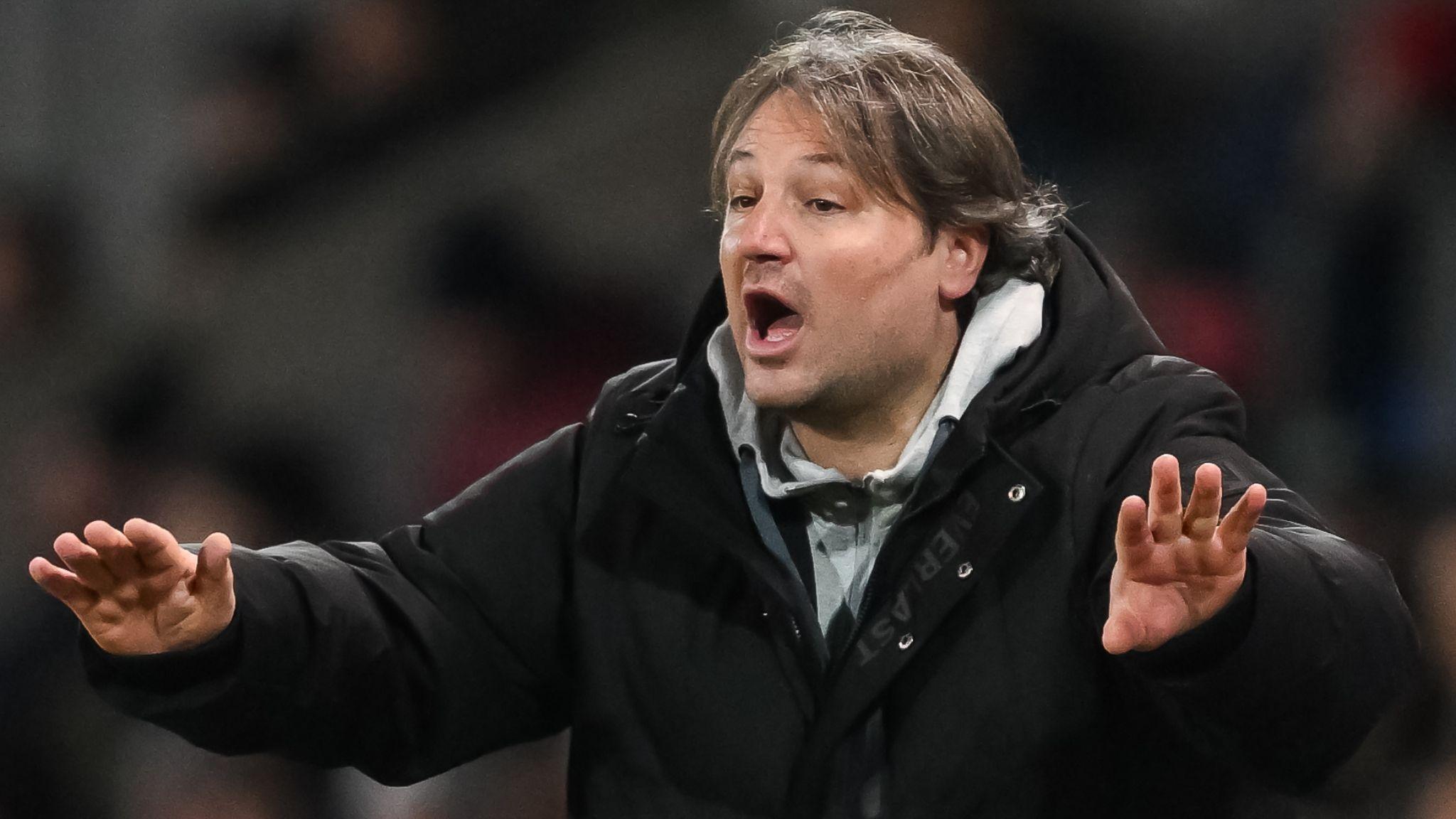 The New Saints manager Craig Harrison gestures on the sideline during a Uefa Conference match