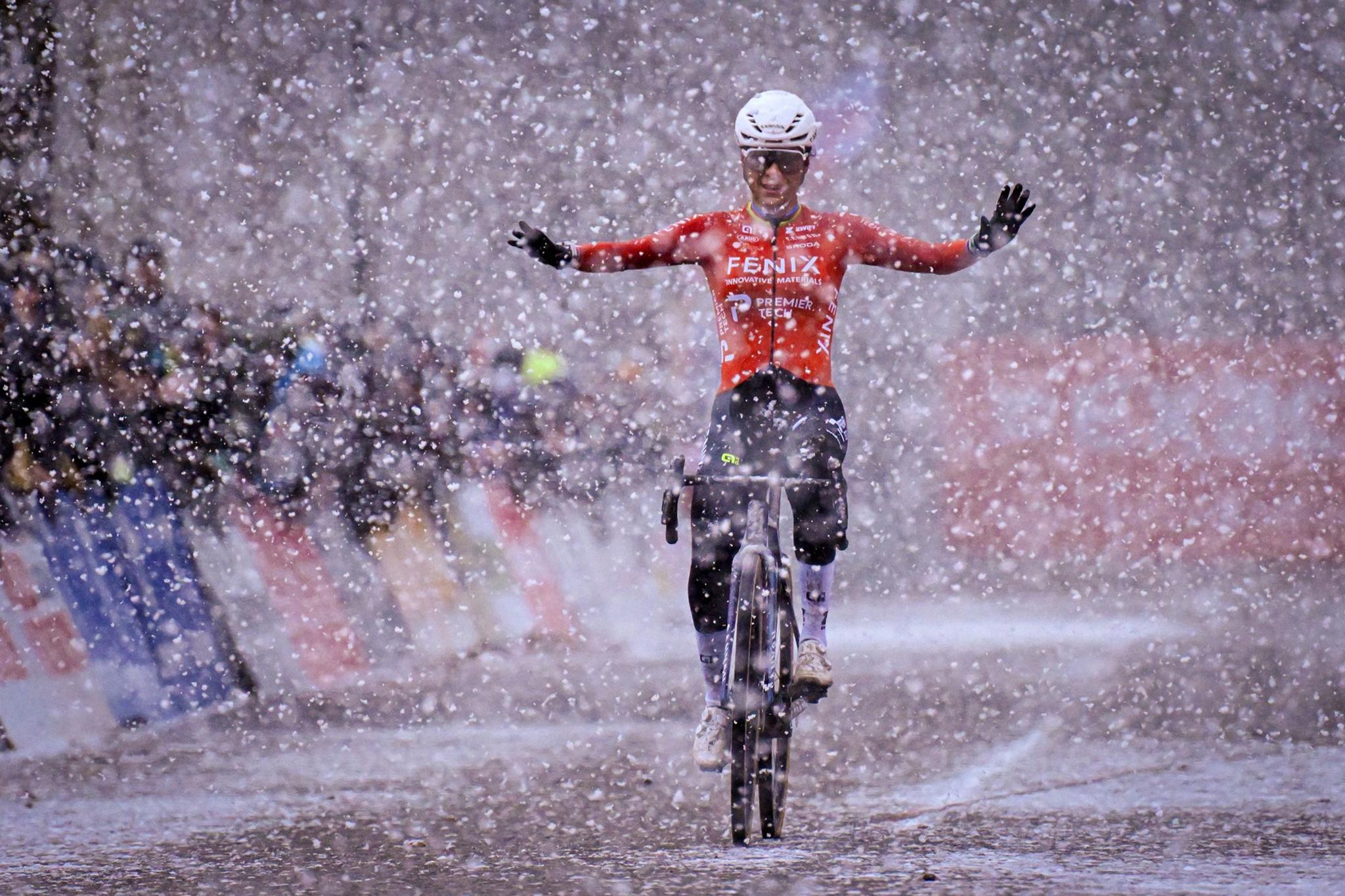 Dutch rider Ceylin Del Carmen Alvarado celebrates as she crosses the finish line to win the women's elite race of the Zilvermeercross cyclocross cycling event in Mol. Photo by Luc Claessen