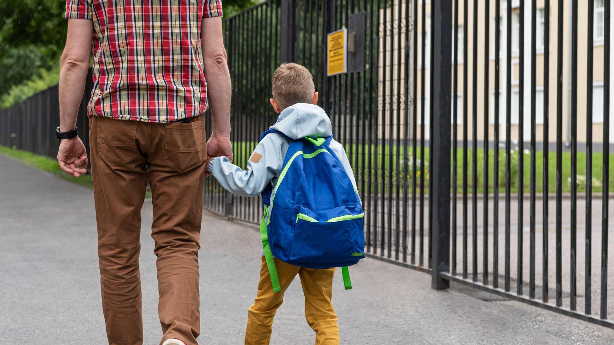 boy-and-dad-outside-school-gates. 