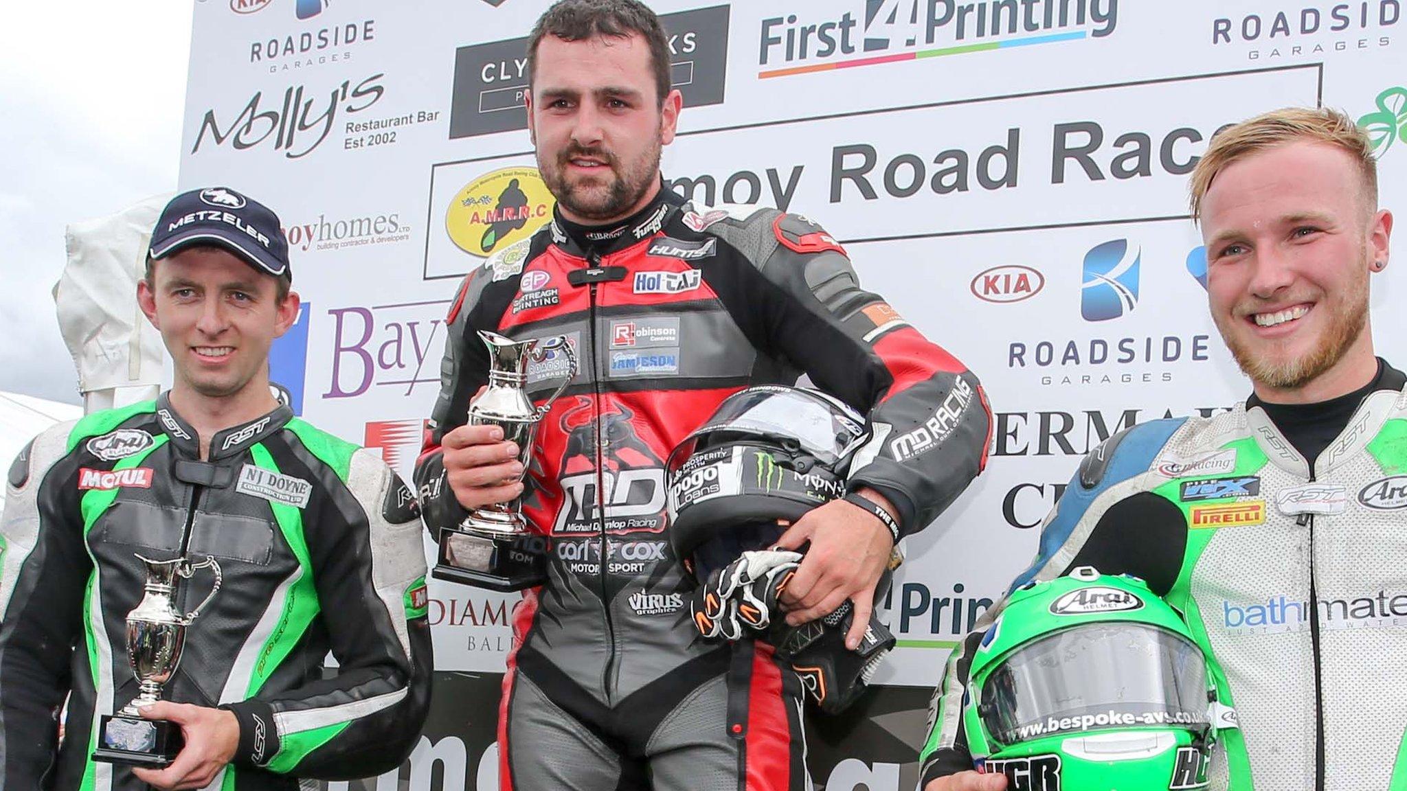 Supersport runner-up Derek McGee with winner Michael Dunlop and third-placed Davey Todd at Armoy on Saturday