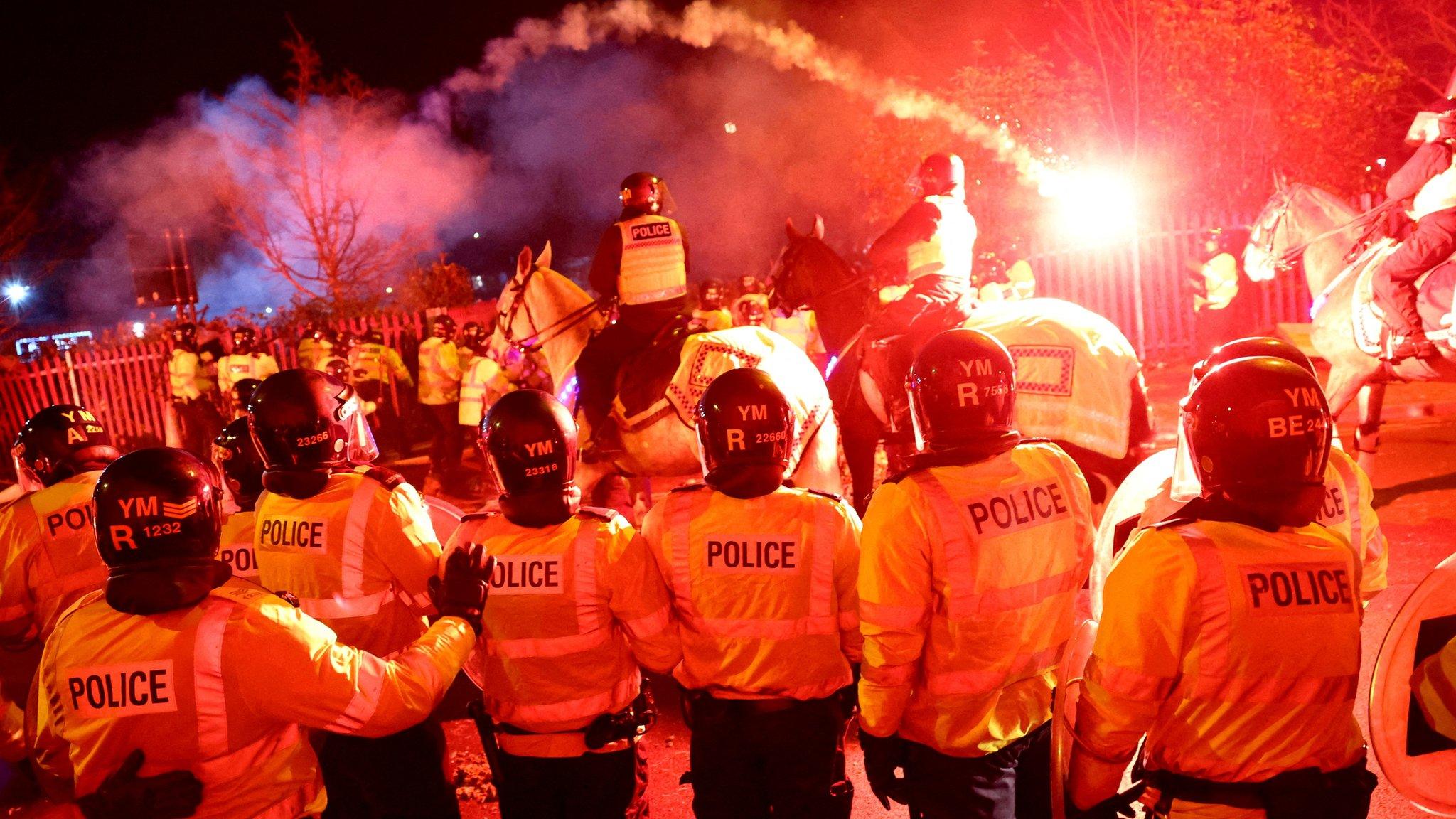 Police clash with Legia Warsaw fans before the Polish club's game at Aston Villa on 30 November