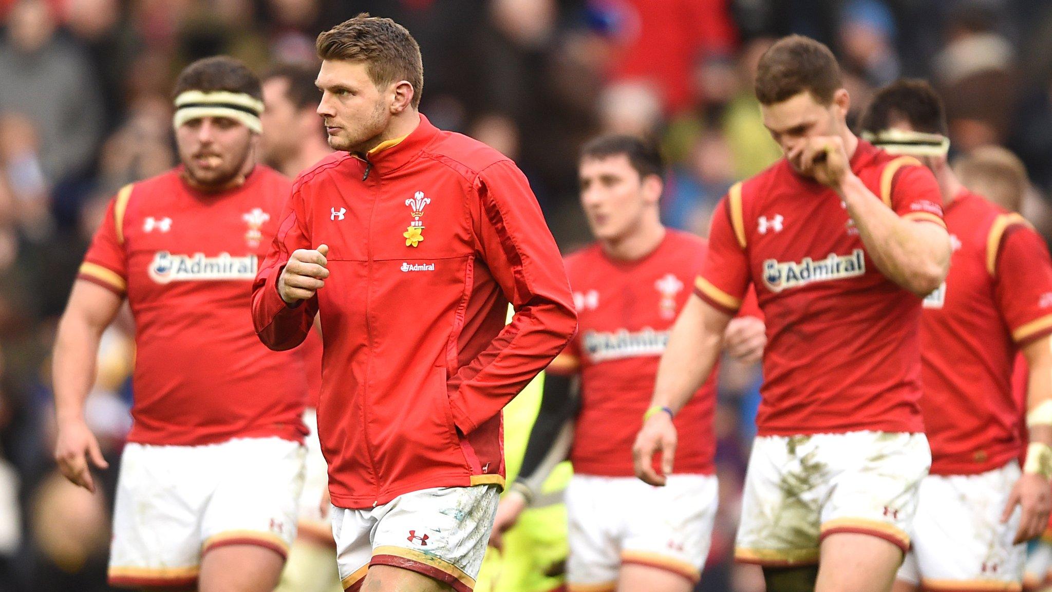 Wales players look dejected after losing to Scotland