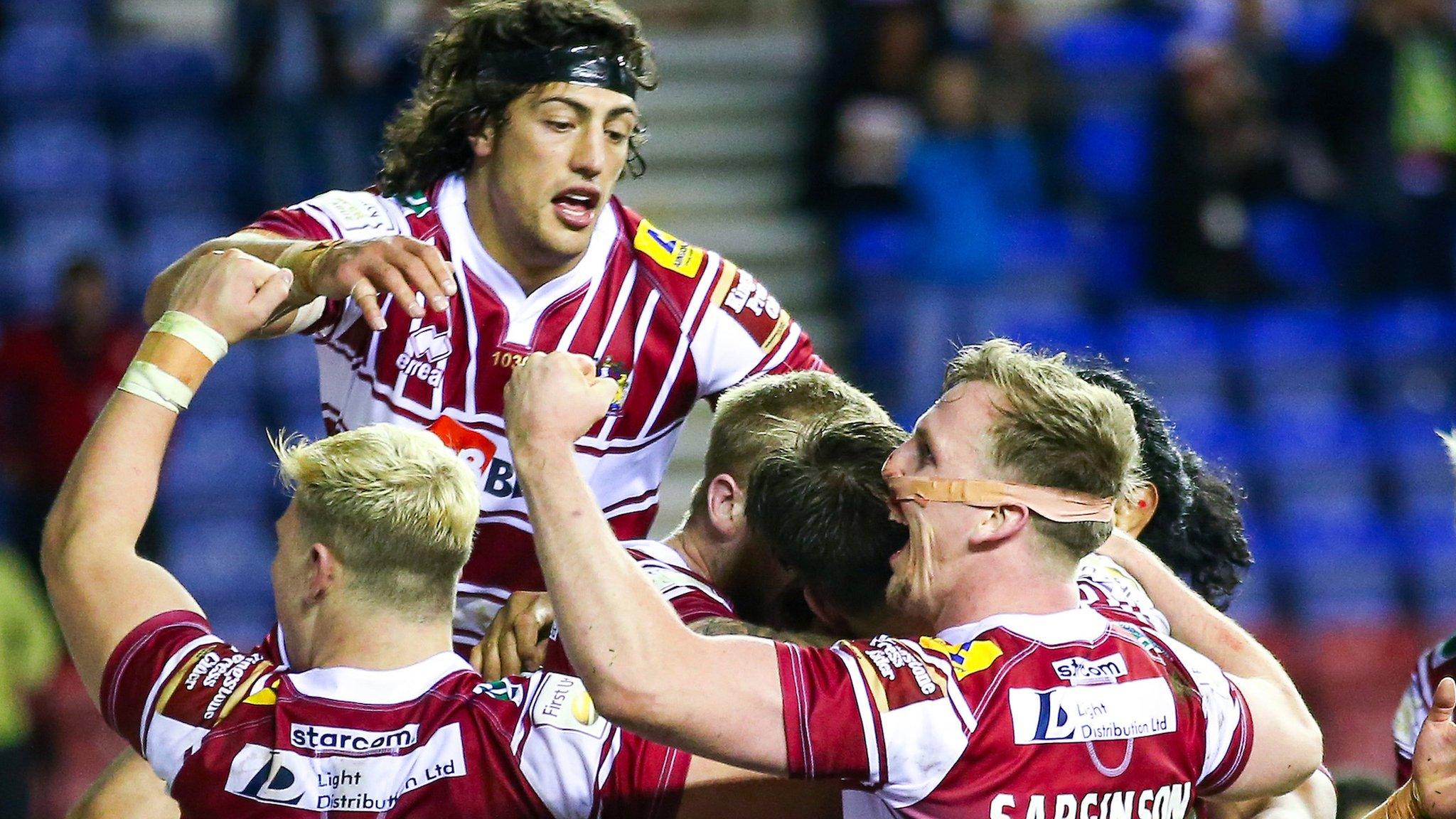 Wigan celebrate their Sam Powell try