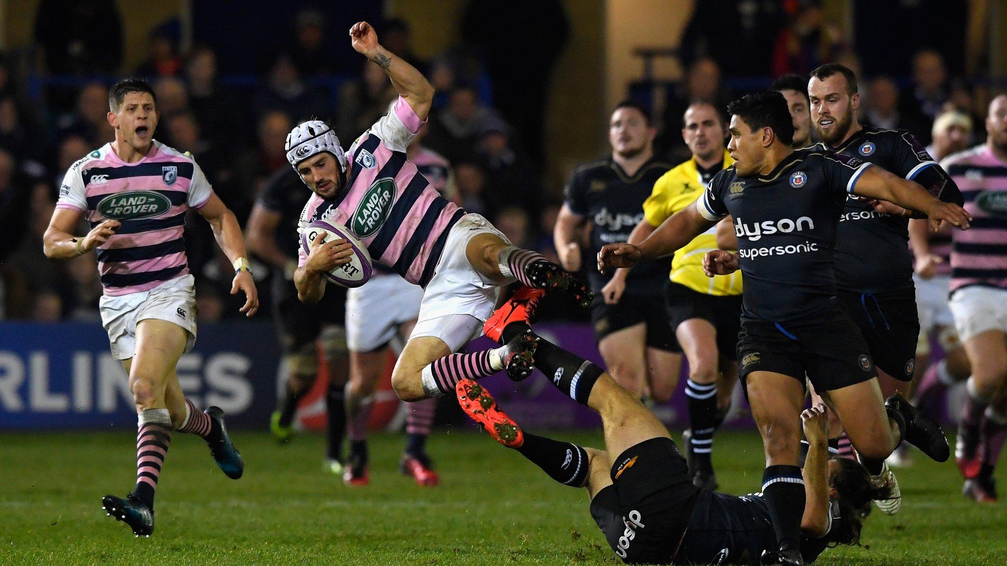 Matthew Morgan rides a tackle in a European match for Cardiff Blues