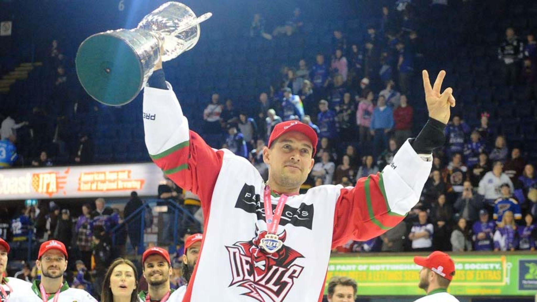 Cardiff Devils' Matthew Myers celebrates with the Play-Off trophy in 2019