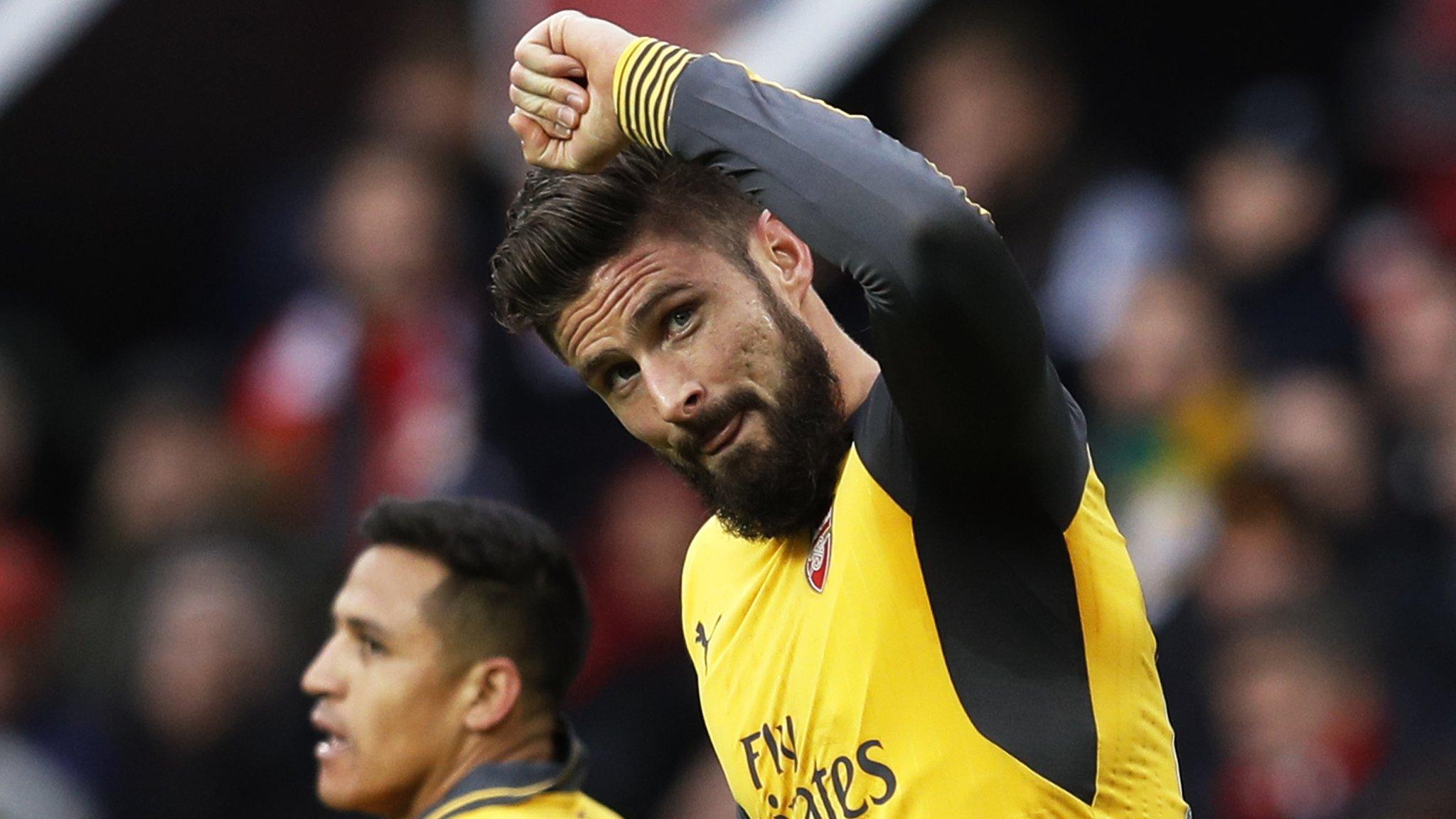 Olivier Giroud celebrates scoring against Man Utd