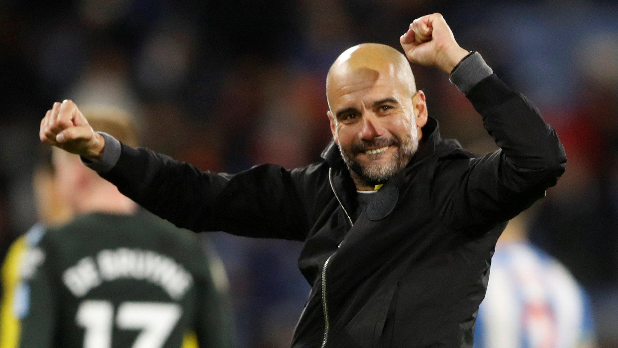 Pep Guardiola celebrates at full-time