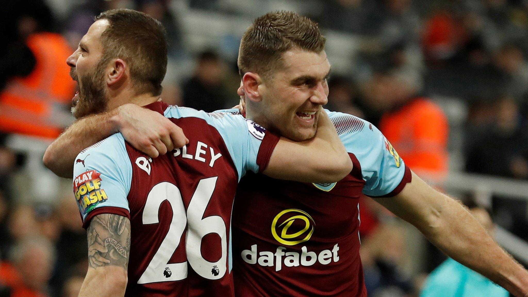 Burnley's Sam Vokes and Phil Bardsley after the equaliser with Newcastle