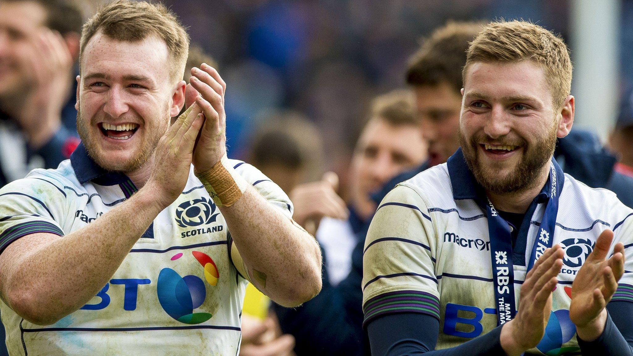 Stuart Hogg and Finn Russell celebrate Scotland's win over Italy