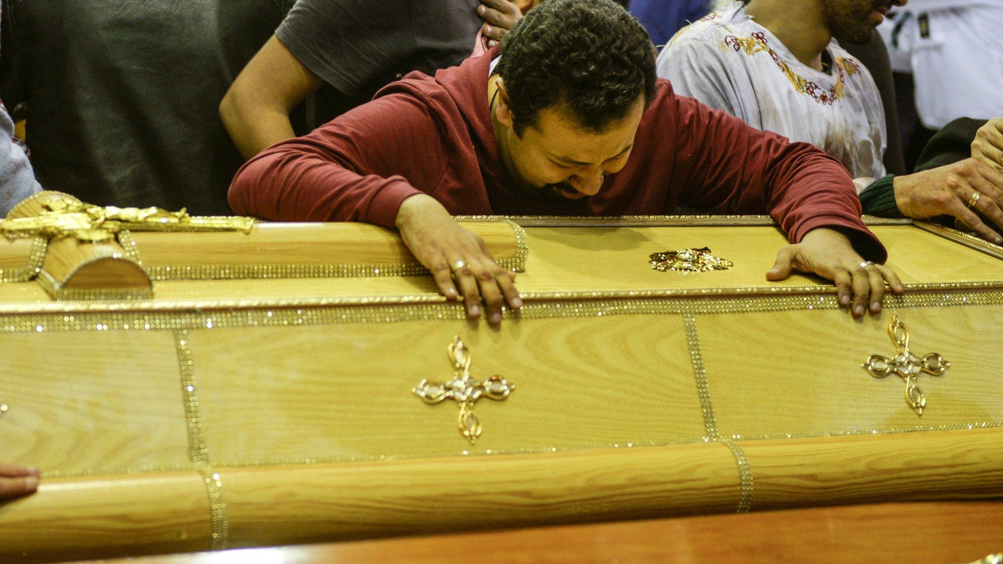 Mourners gather for funerals for victims of a bomb explosion at Mar Girgis Coptic church in Tanta, Egypt 10 April 2017