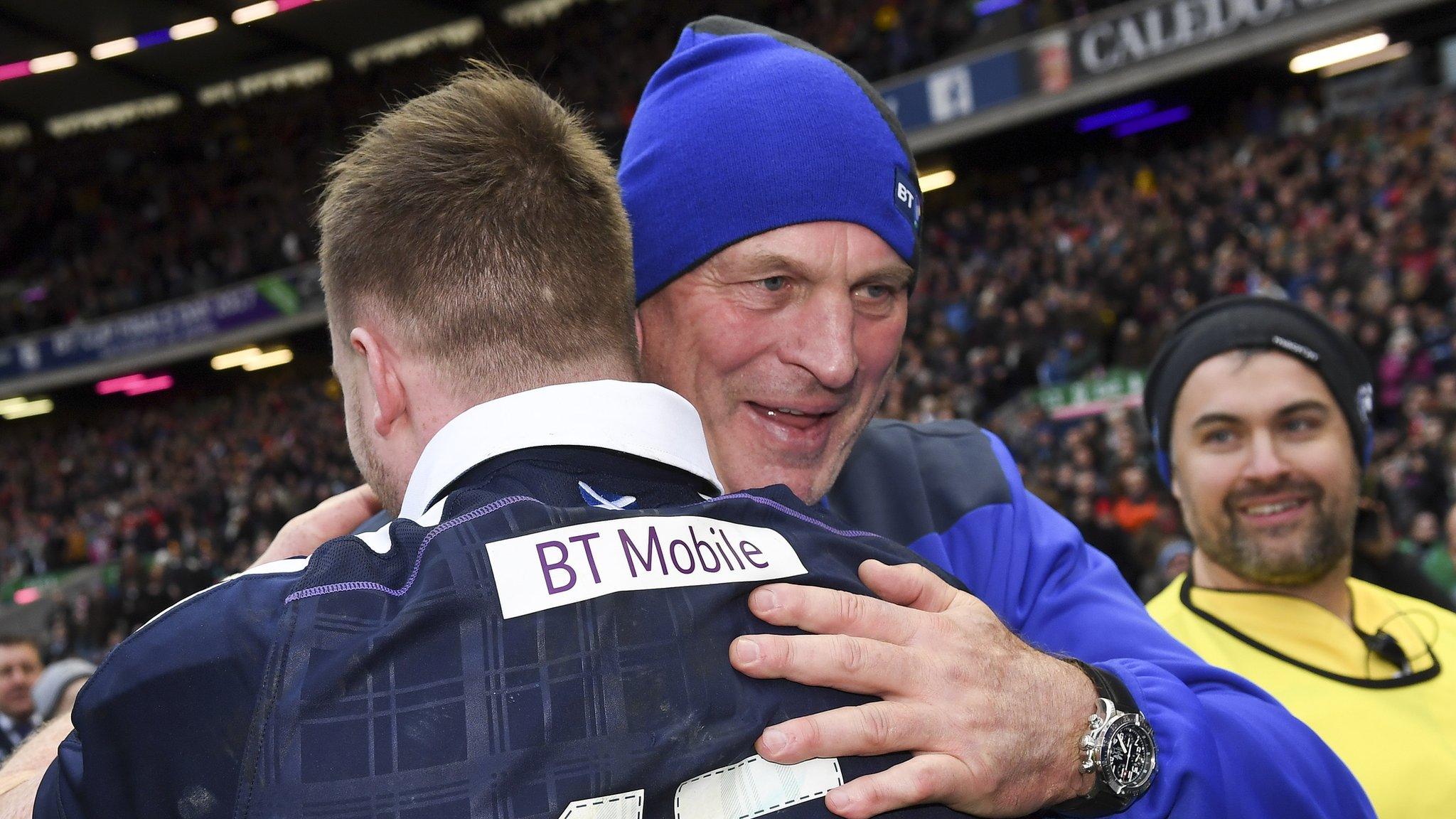 Scotland head coach Vern Cotter embraces full-back Stuart Hogg