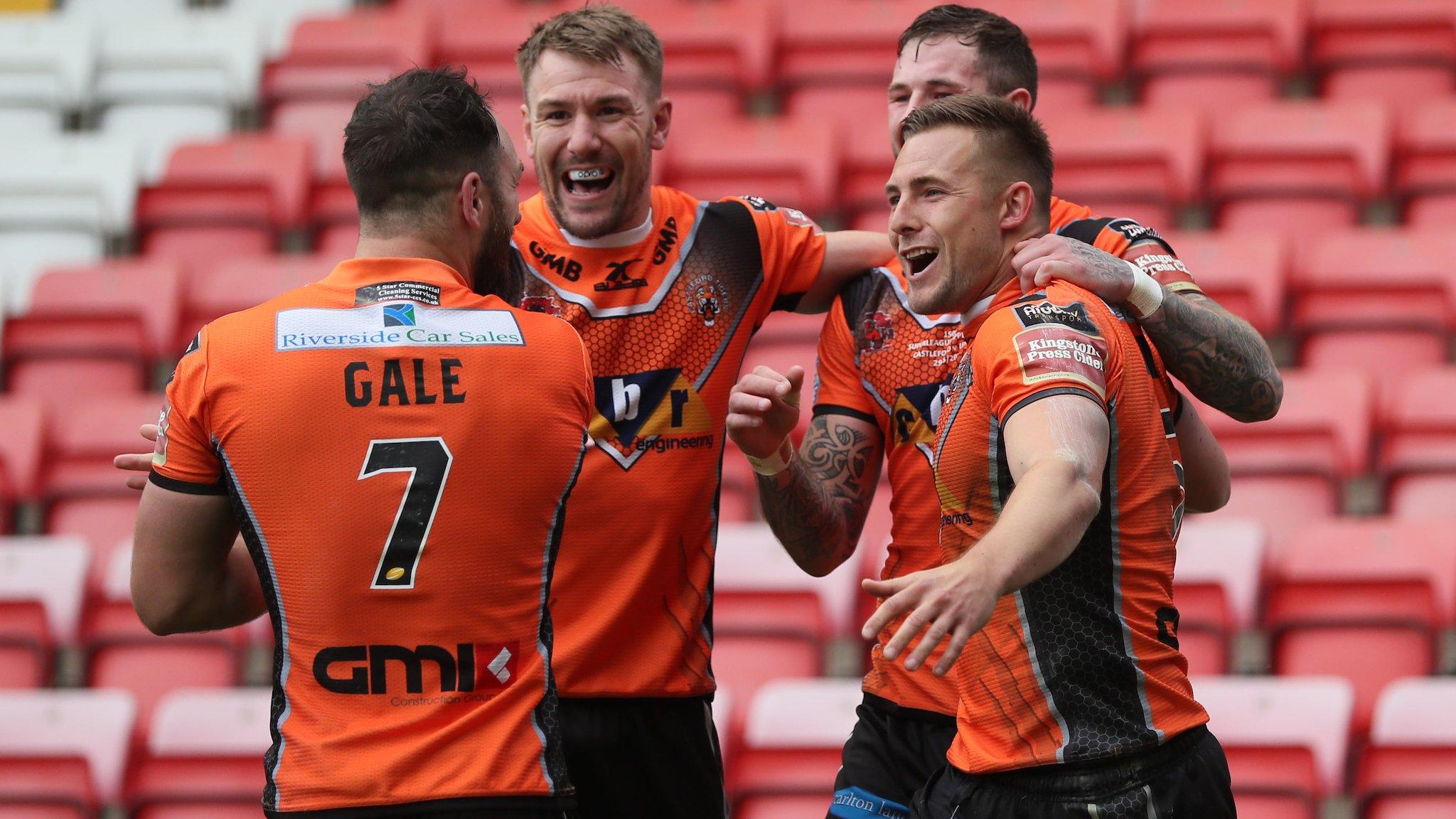 Greg Eden and Michael Shenton celebrate