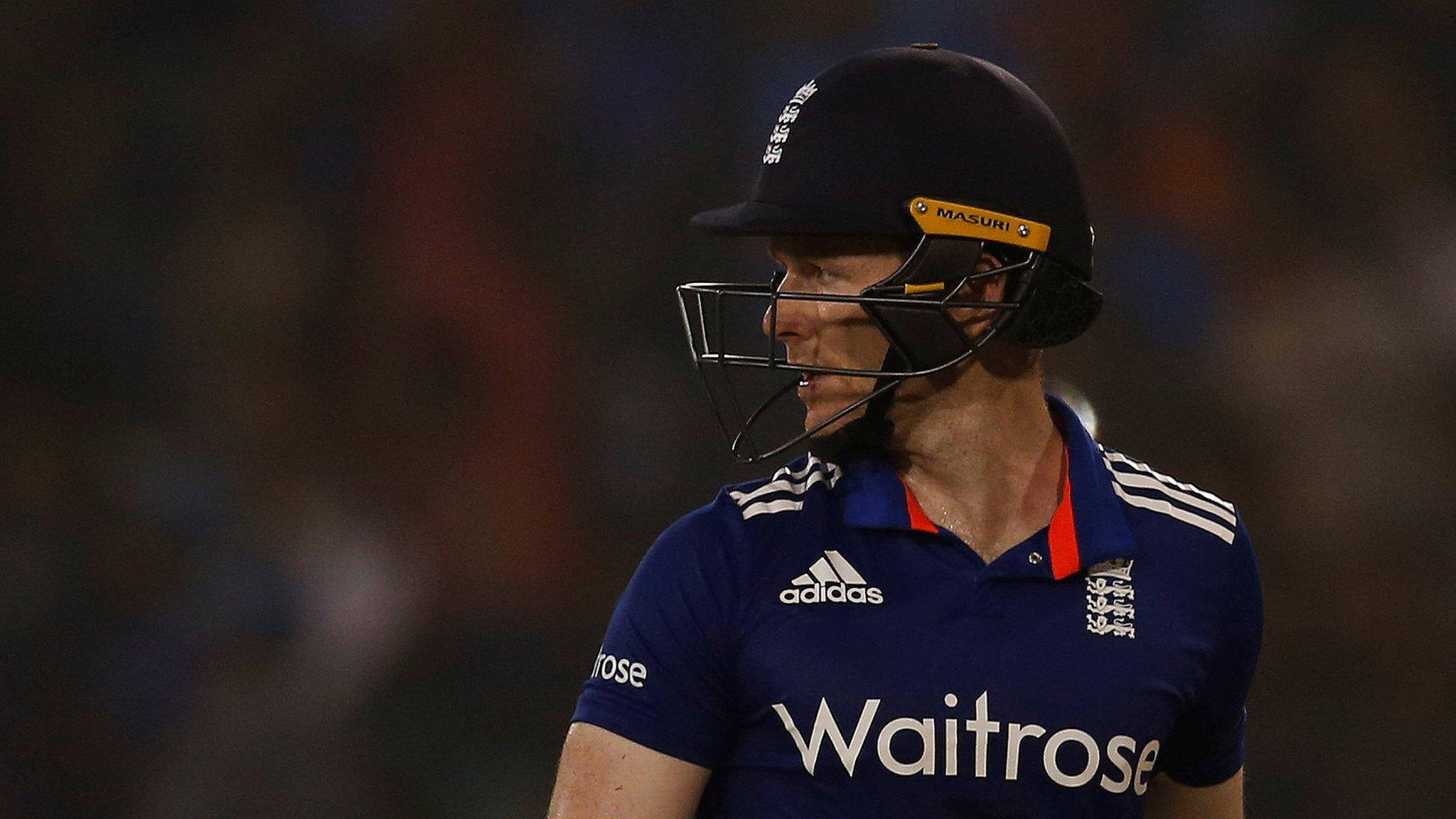 Eoin Morgan reacts as he leaves the field