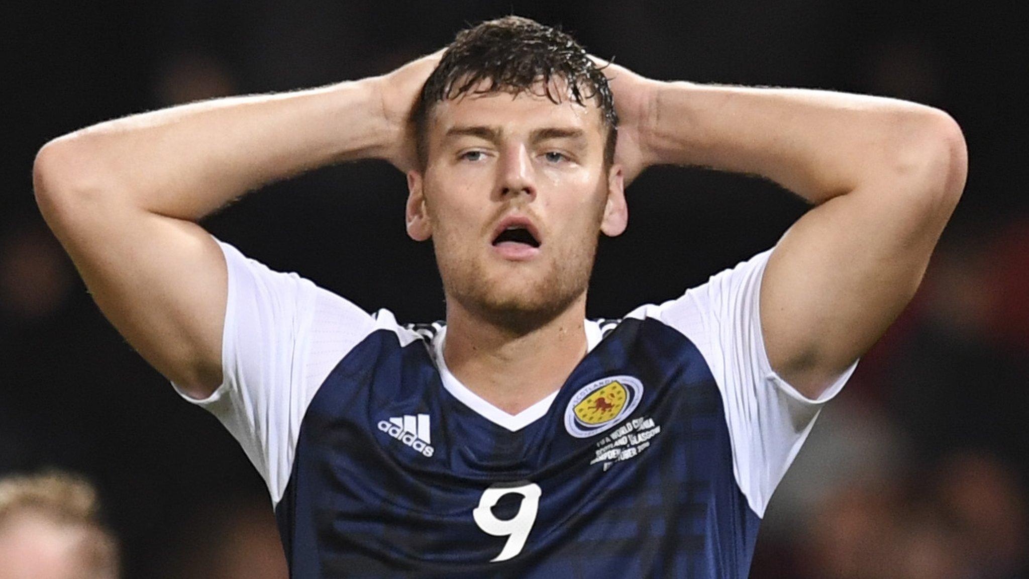 Chris Martin reacts after missing a chance during Scotland's draw with Lithuania