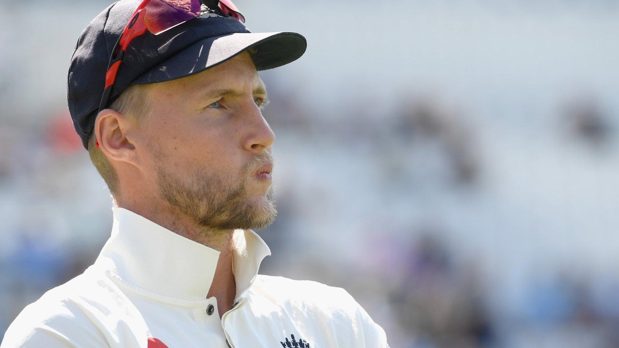 Joe Root looks on dejectedly