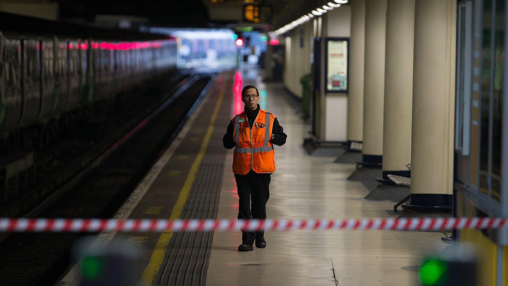 Southern Rail employee on an empty platform at Victoria Station on a strike day in December 2016