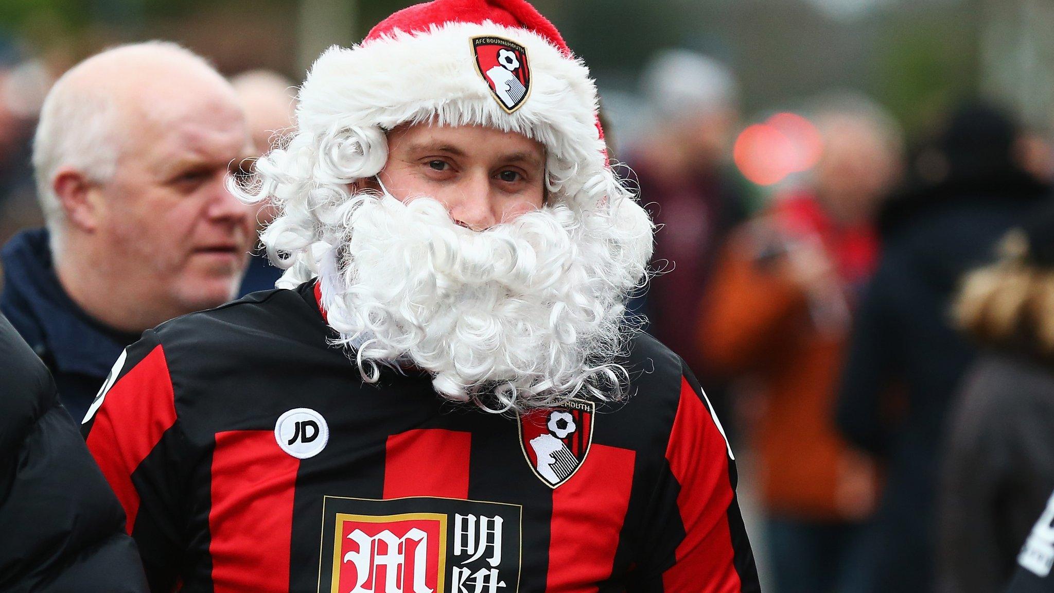 A Bournemouth fan in a Santa outfit