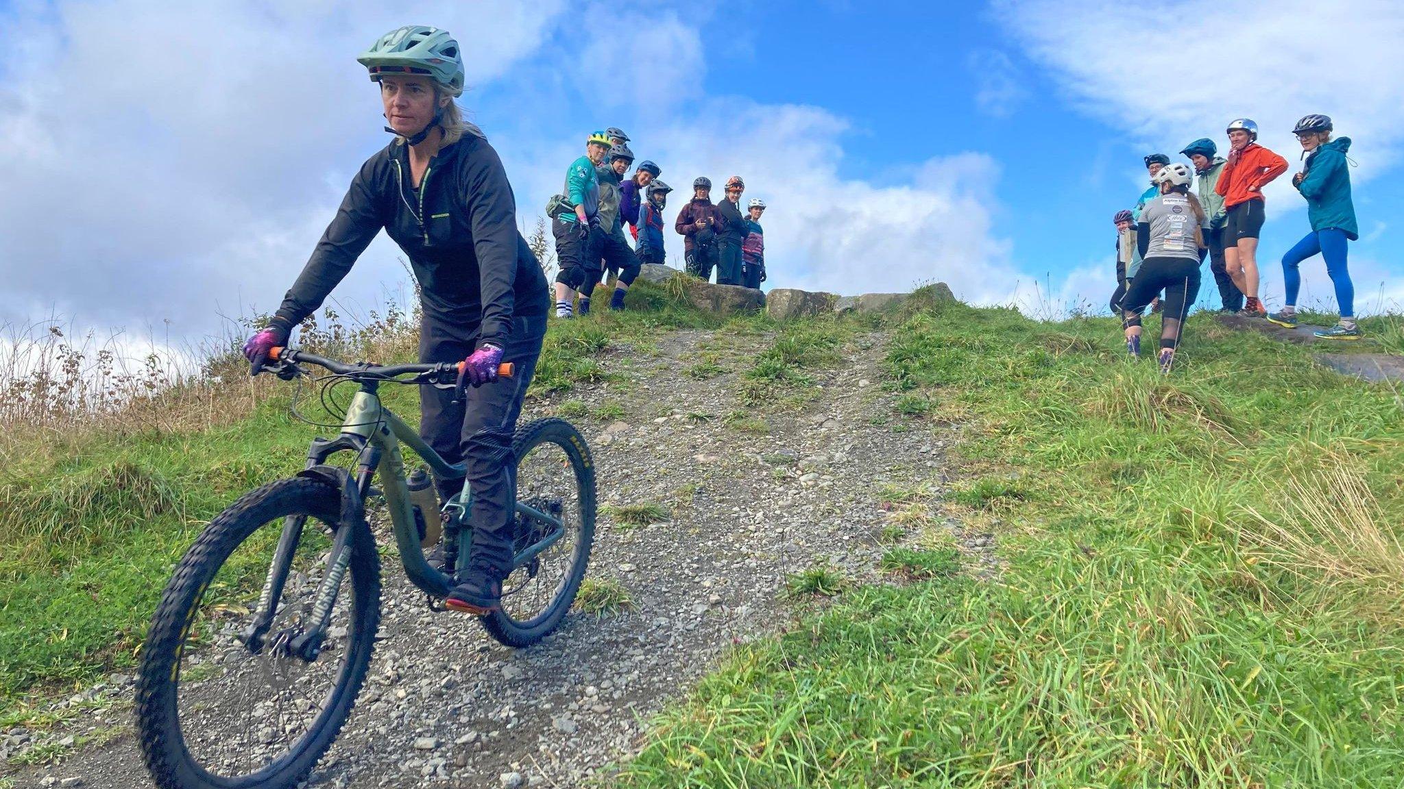 Woman on mountain bike