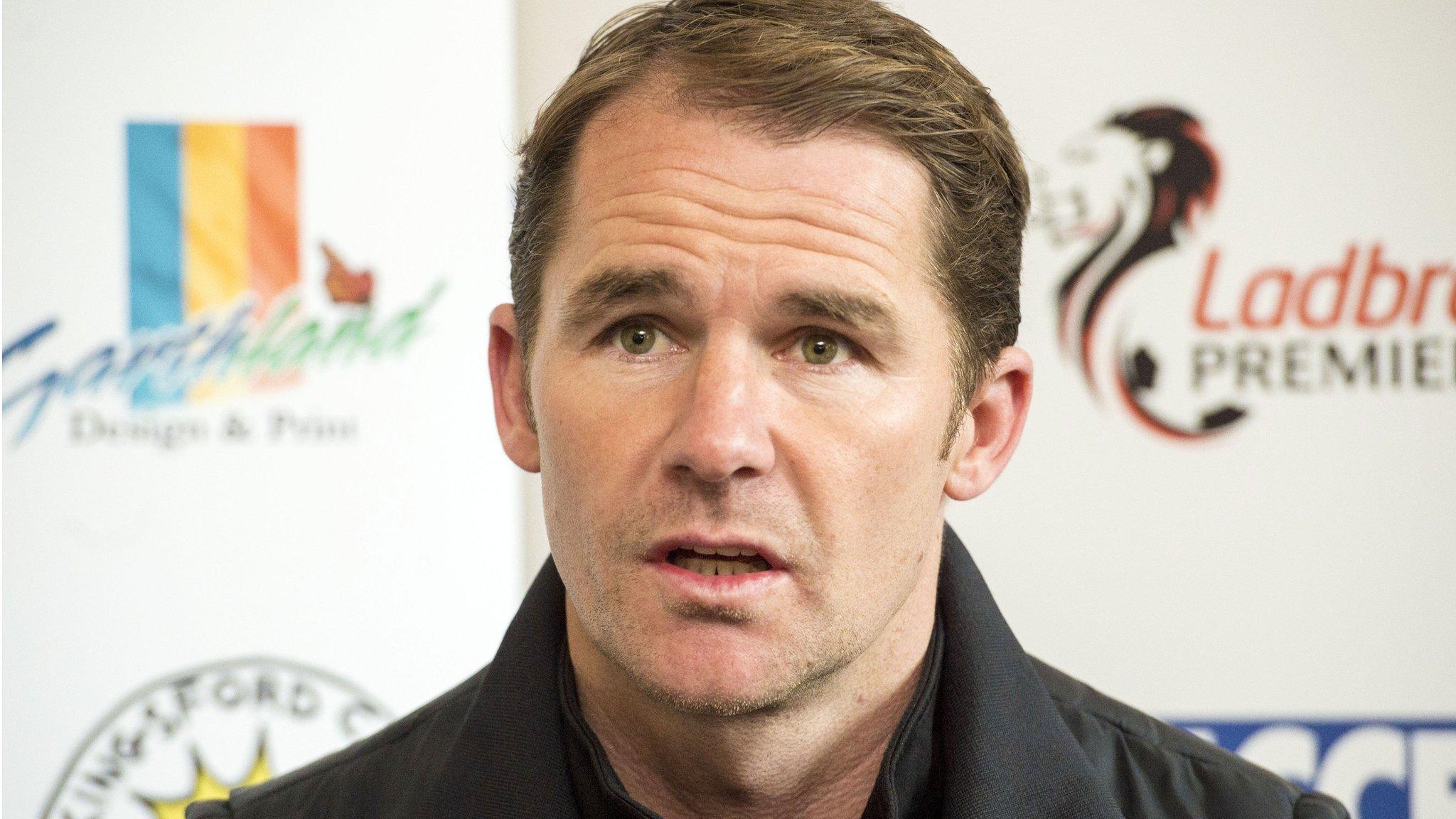 Partick boss Alan Archibald speaks to the media