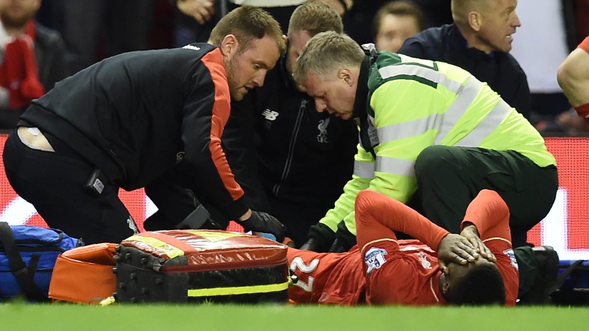 Divock Origi is carried off