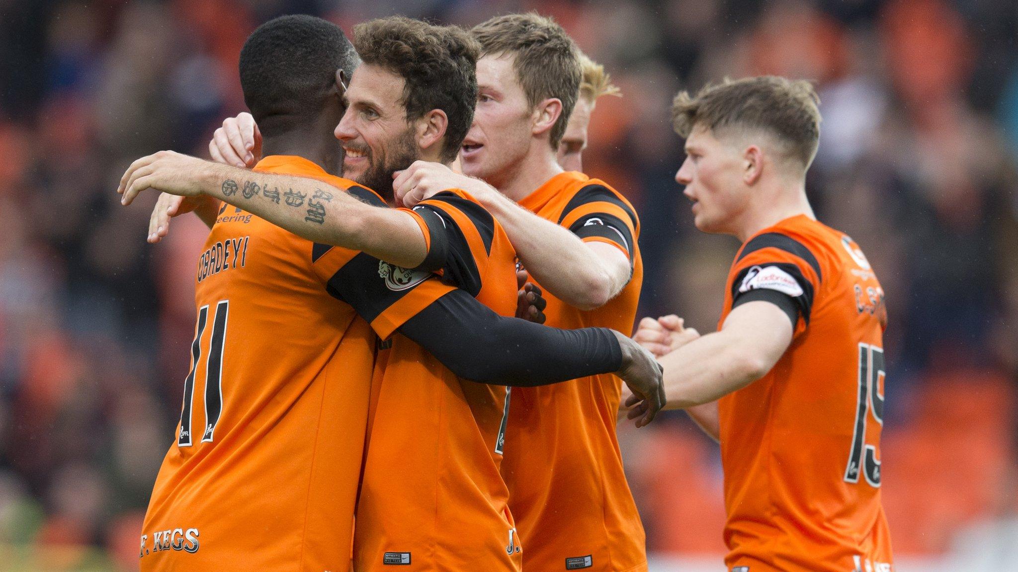 Dundee United's Tony Andreu (second left) celebrates scoring the opening goal