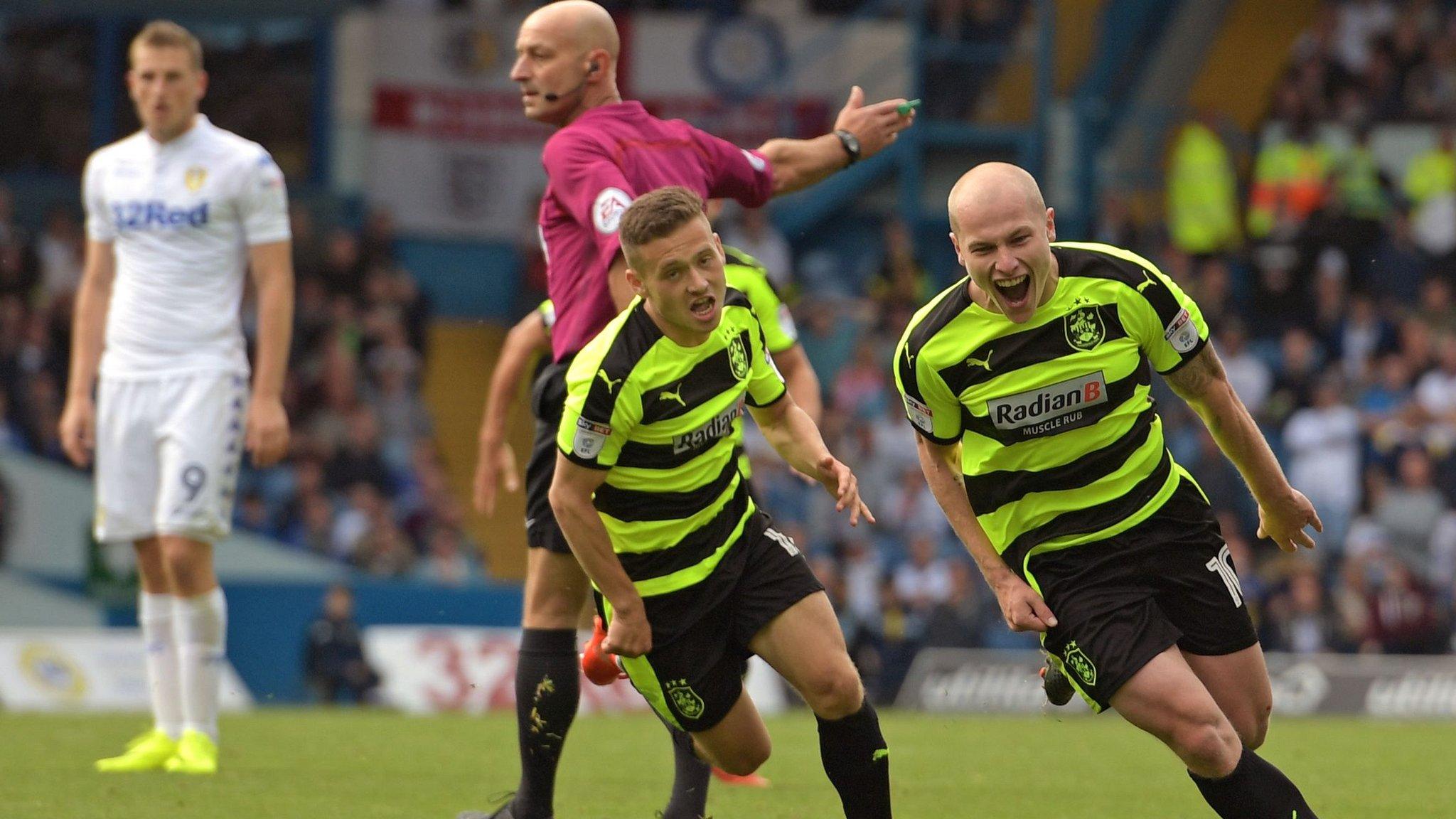 Aaron Mooy celebrates his winning goal for Huddersfield against Leeds