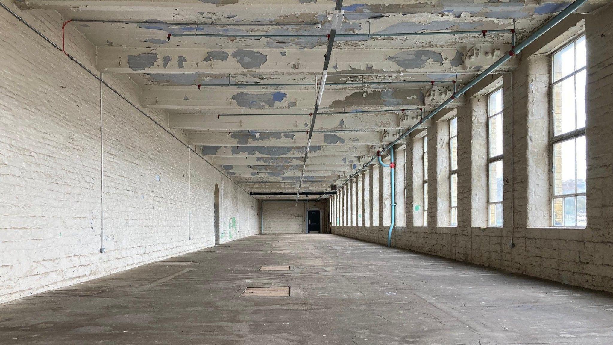 The empty room in Salts Mills which will be the Peace Museum 