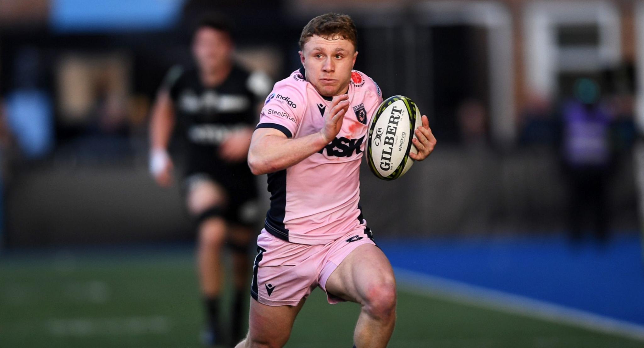 Cardiff's Tom Bowen runs towards the try line with ball in hand