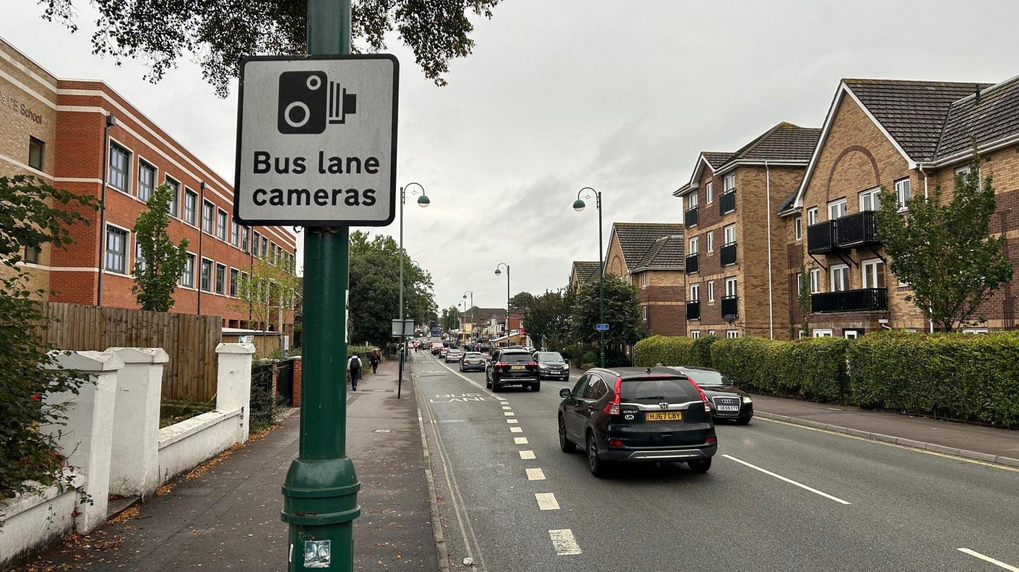 The bus lane in Shirley Road in Southampton, which is enforced with ANPR cameras. Pictured on an overcast day. Cars are driving on the road.