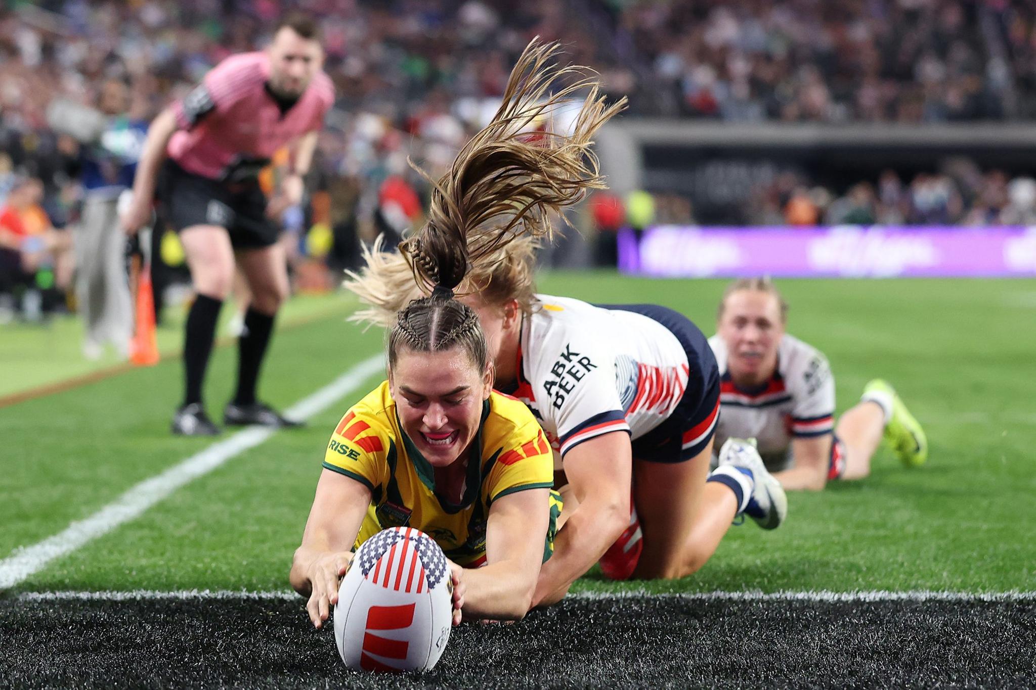 Australias Jakiya Whitfeld scores a try during the International Match between the Australia Jillaroos and England at Allegiant Stadium in Las Vegas, Nevada