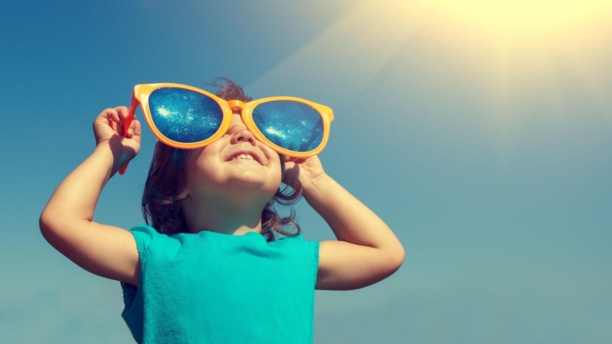 Girl with big sunglasses on