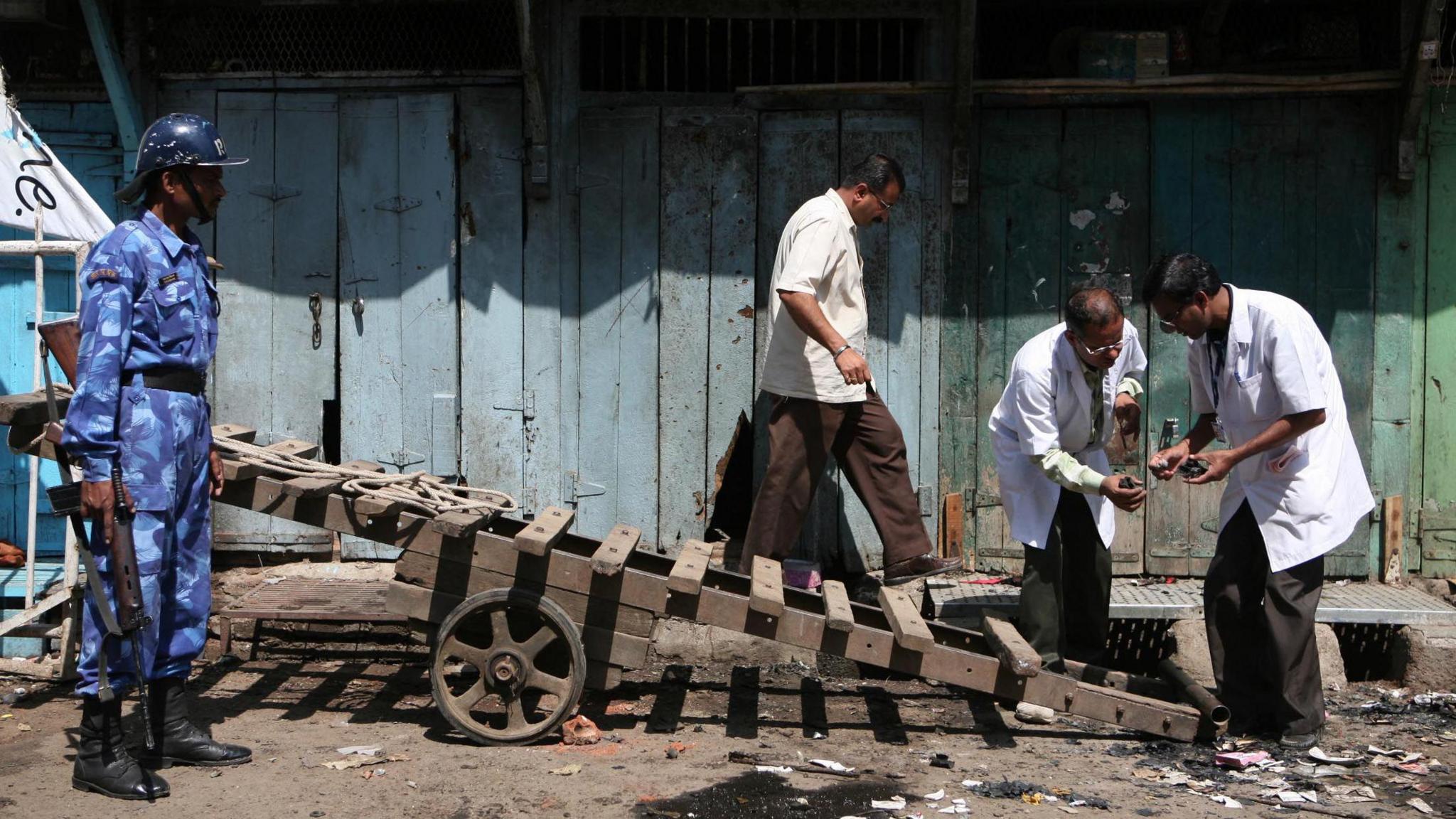 Malegaon Bomb Blast - Forensic experts collect evidence from the site of the explosion.
