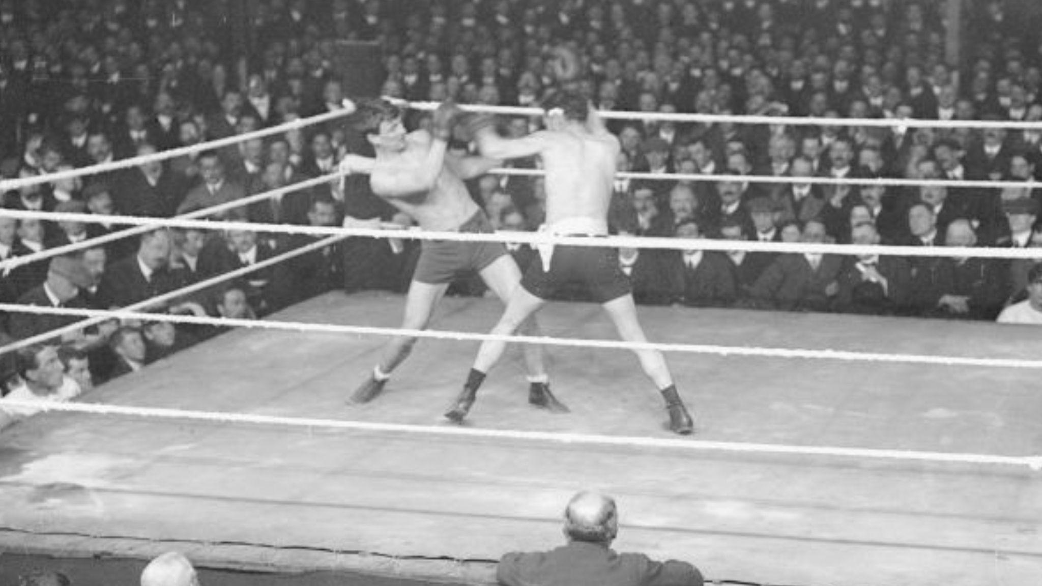 Freddie Welsh of Wales avoids fellow countryman Jim Driscoll's left glove during their contest at Cardiff