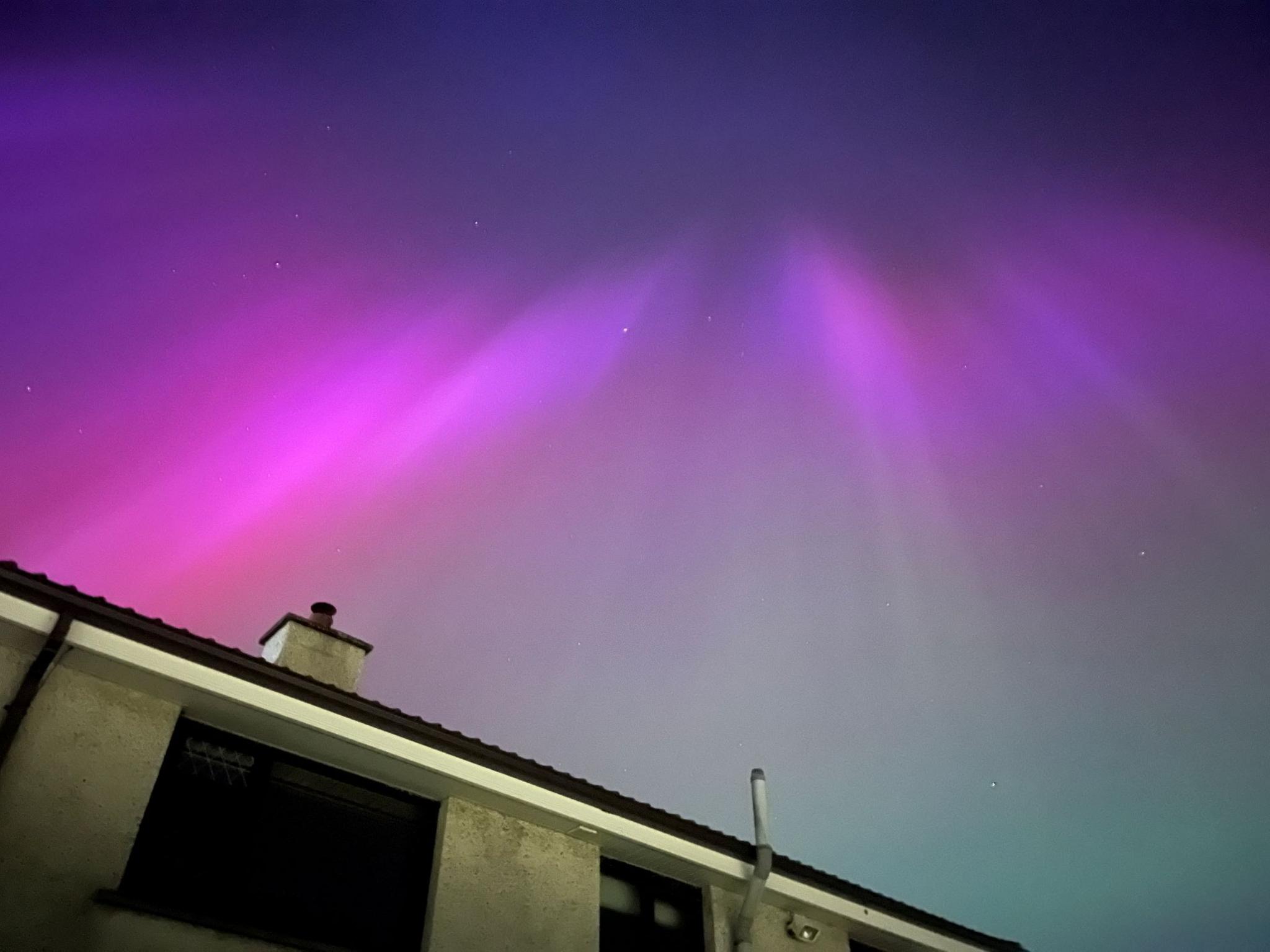 pink skies above a roof