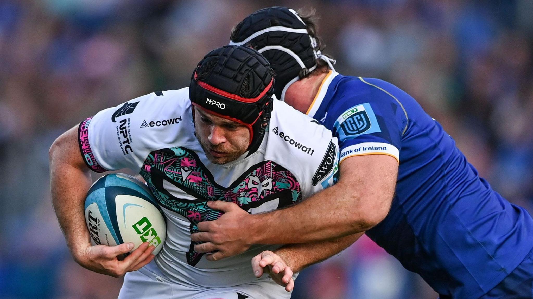 Ospreys number eight Morgan Morris attacks the Leinster defence