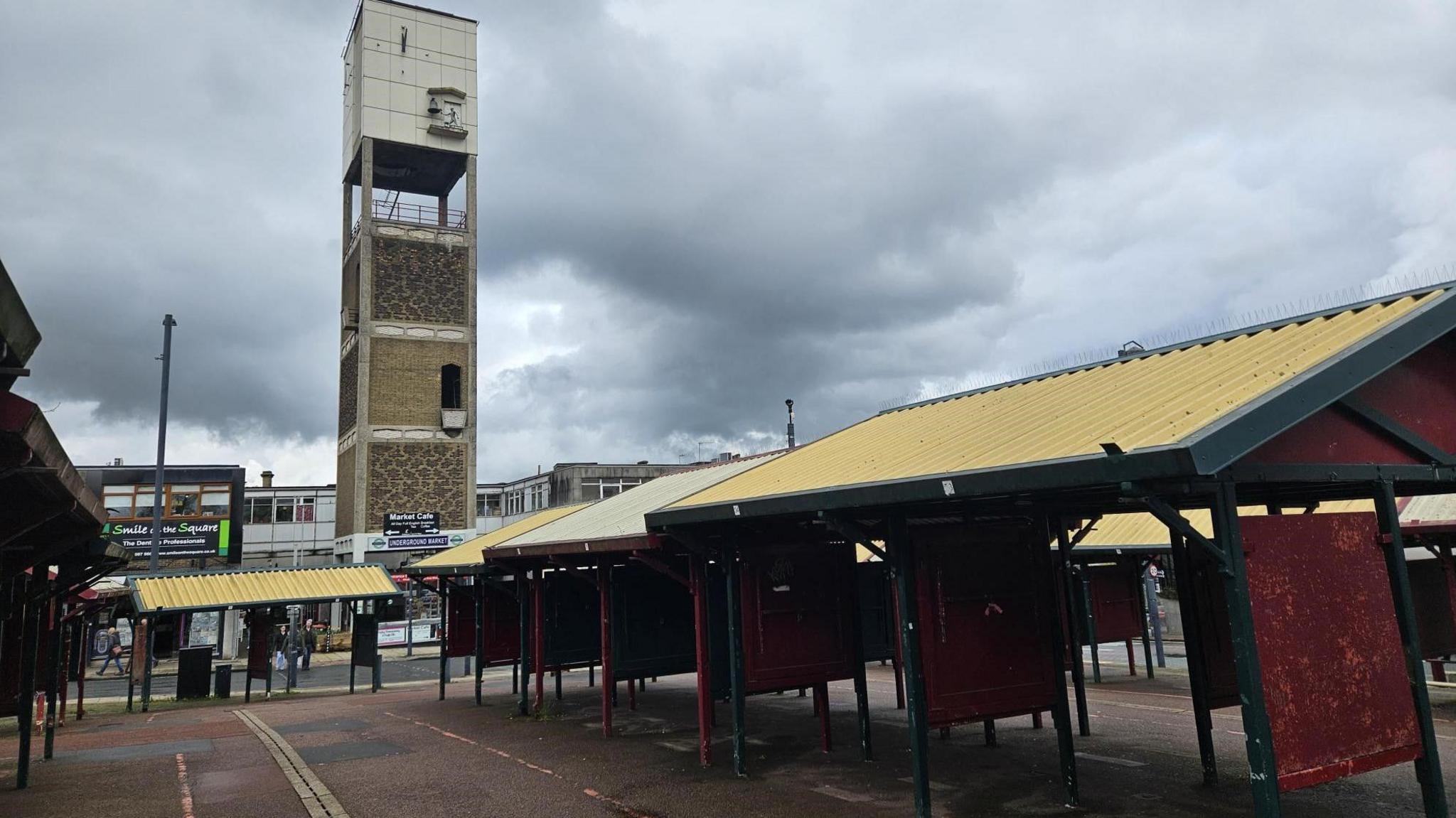 Empty market stalls in Shipley