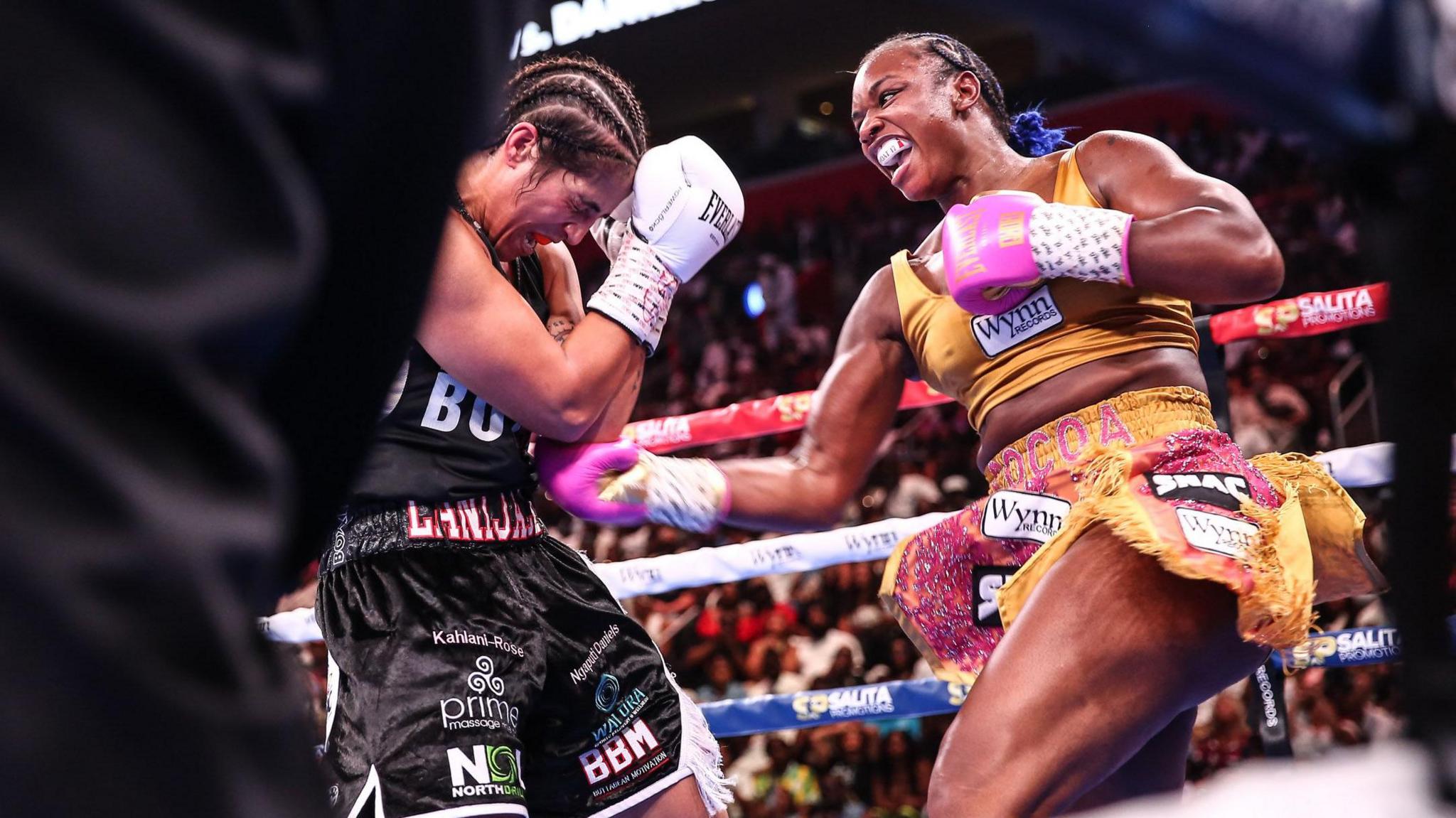 Lani Daniels is punched to the body by Claressa Shields