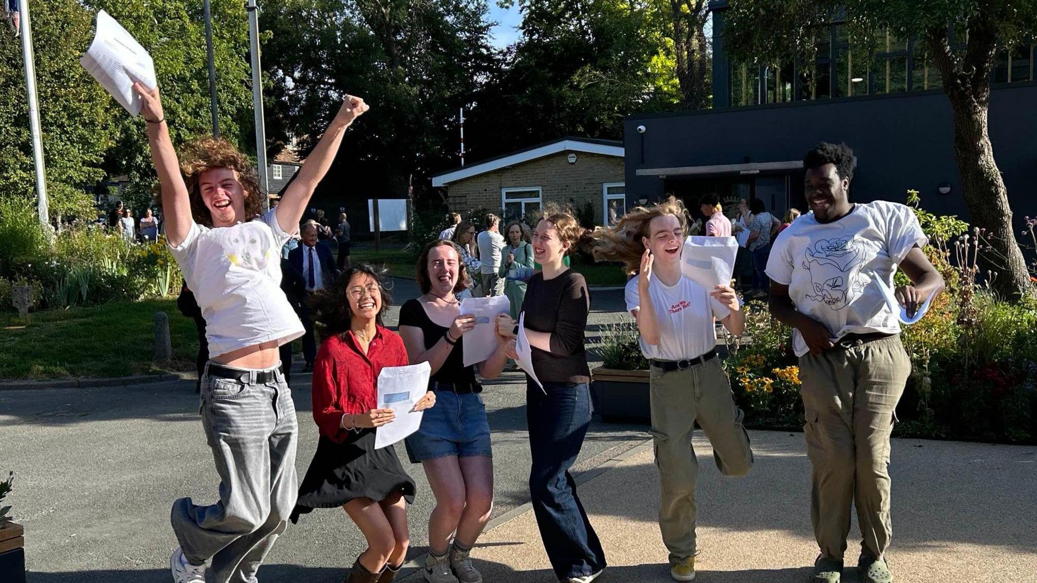 A-level students receiving their results at Queen Elizabeth's Grammar School on Thursday