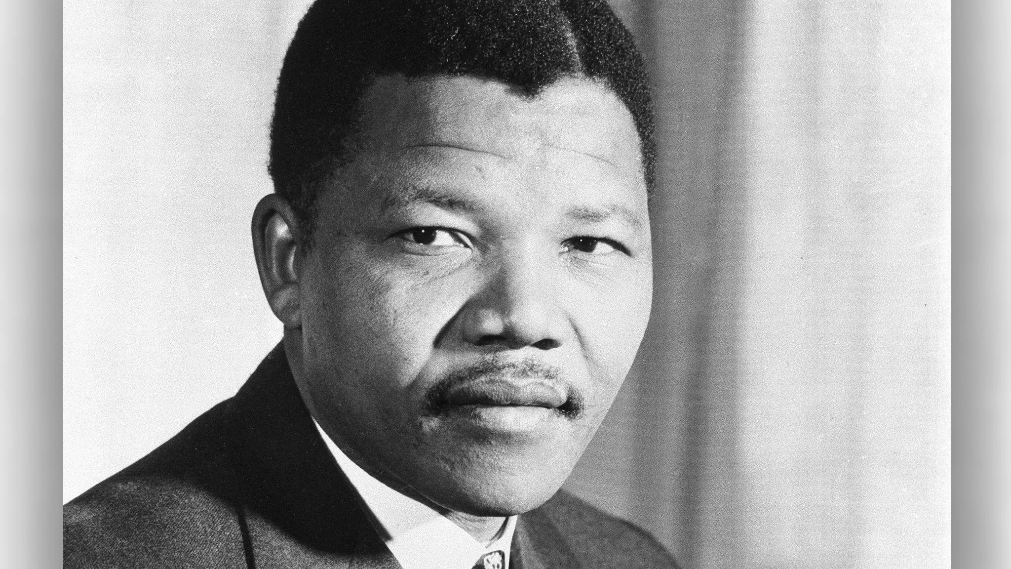 an archive portrait photo of nelson mandela