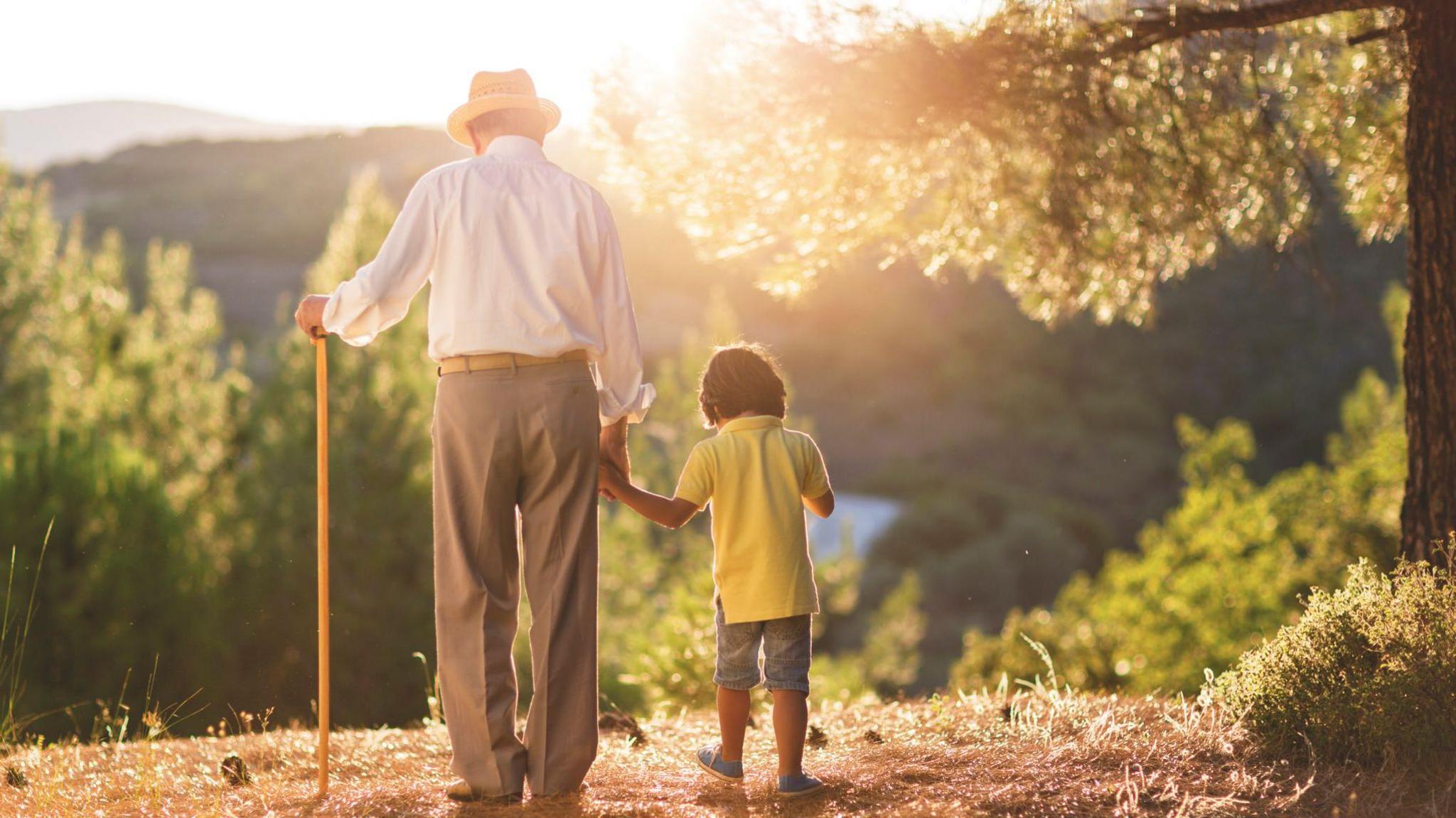 A stock image of an older man with a child