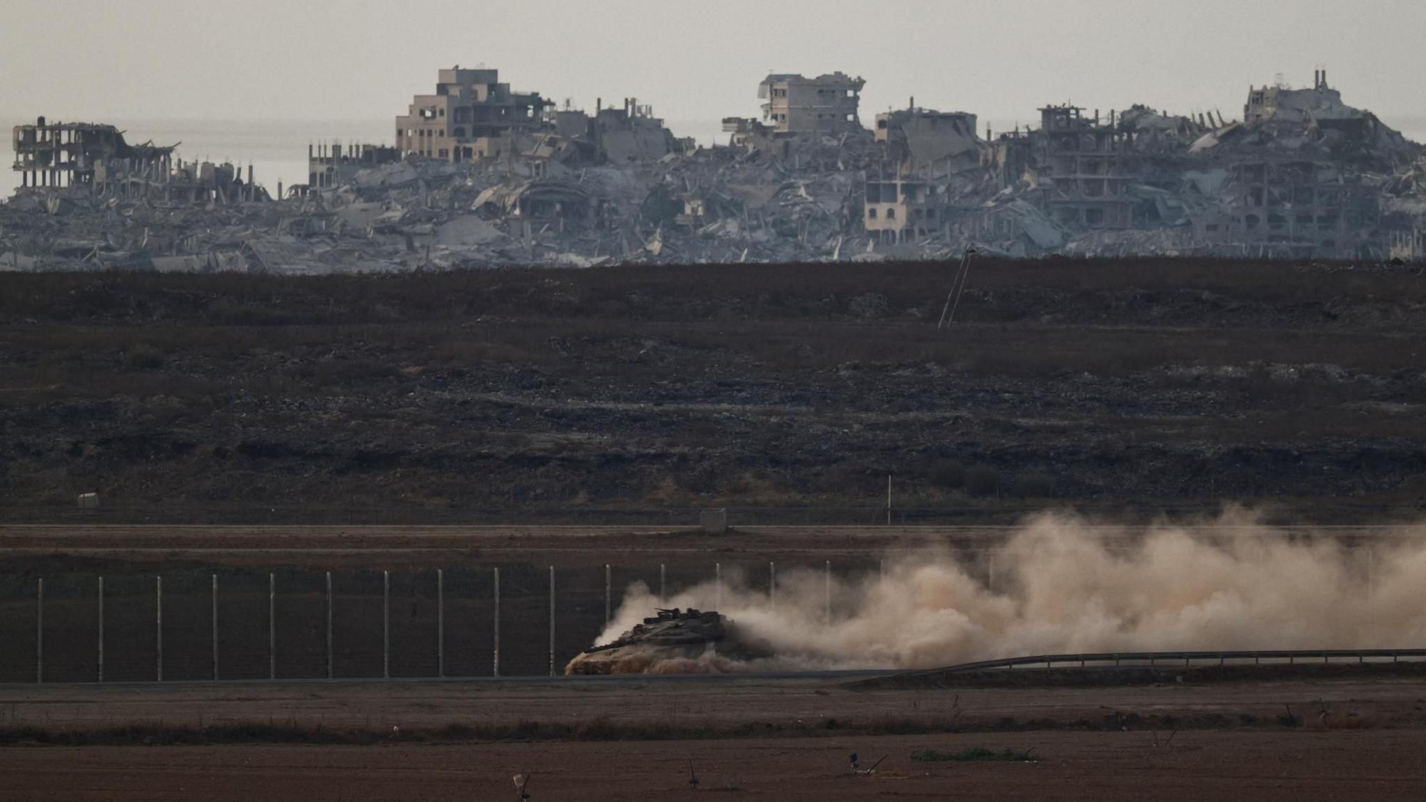 An Israeli tank moves next to the Gaza perimeter fence, in southern Israel (8 September 2025)