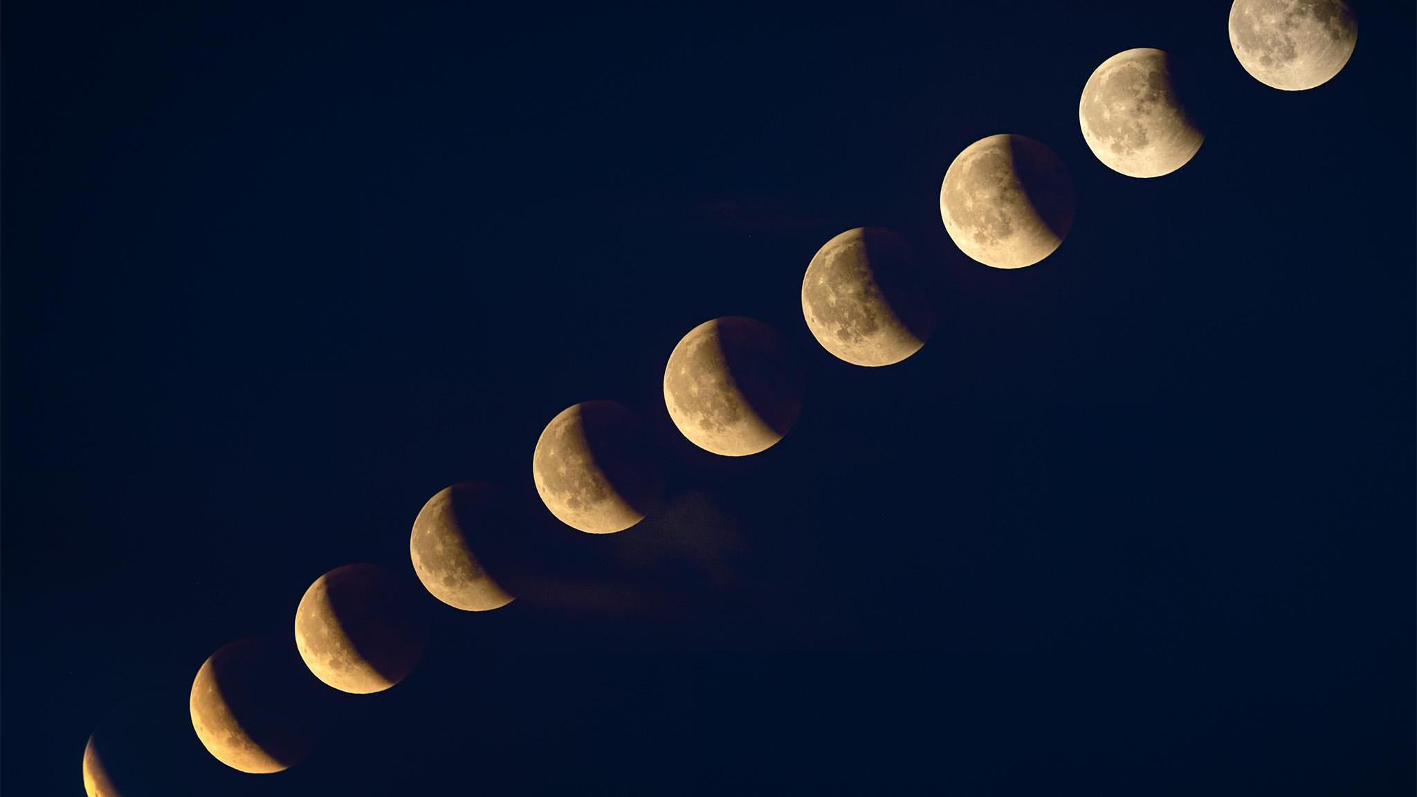 A time-lapse image of the different moons from crescent to full.